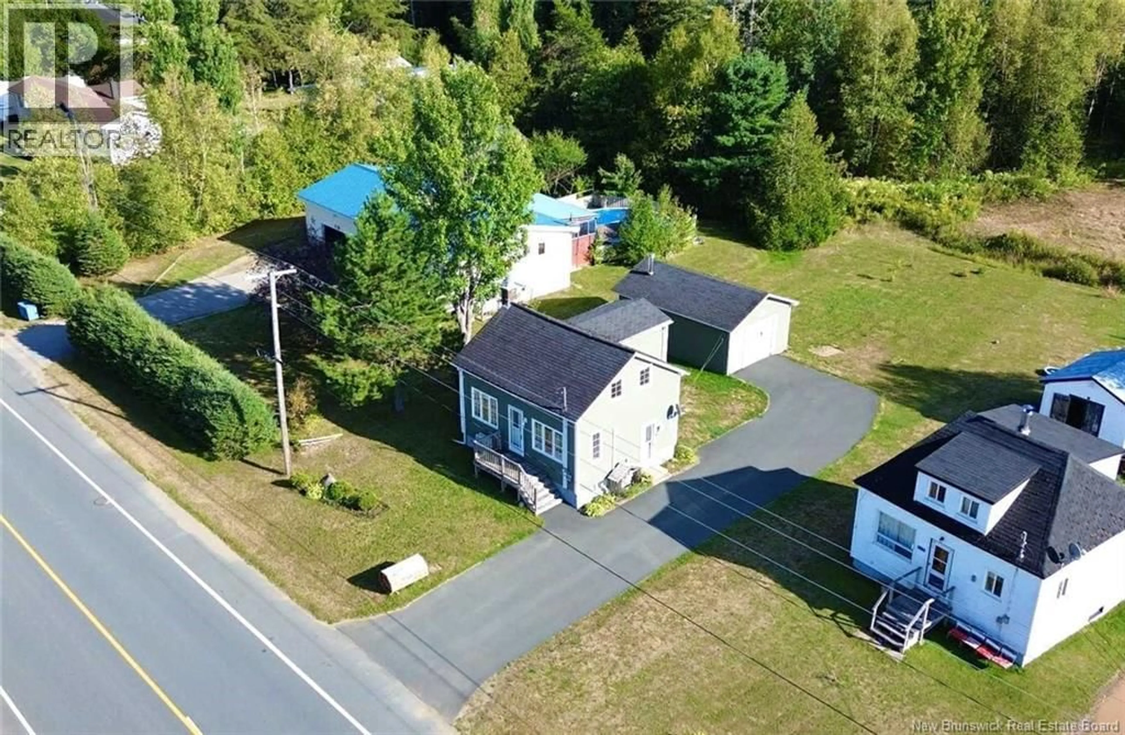 A pic from outside/outdoor area/front of a property/back of a property/a pic from drone, street for 116 RUE ECOLE, Rogersville New Brunswick E4Y1V7