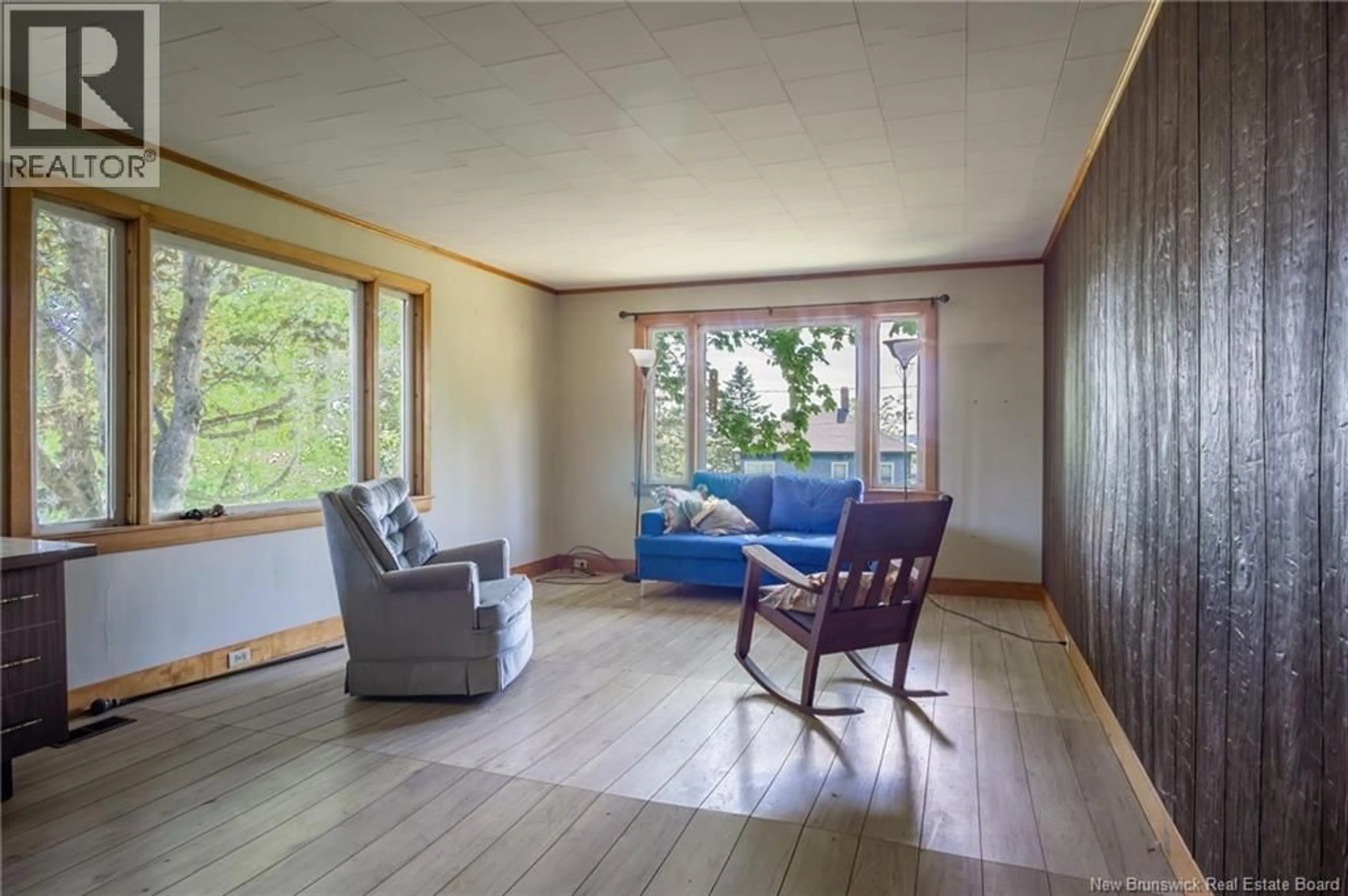 Living room with furniture, wood/laminate floor for 2561 ROUTE 774, Wilsons Beach New Brunswick E5E1J8