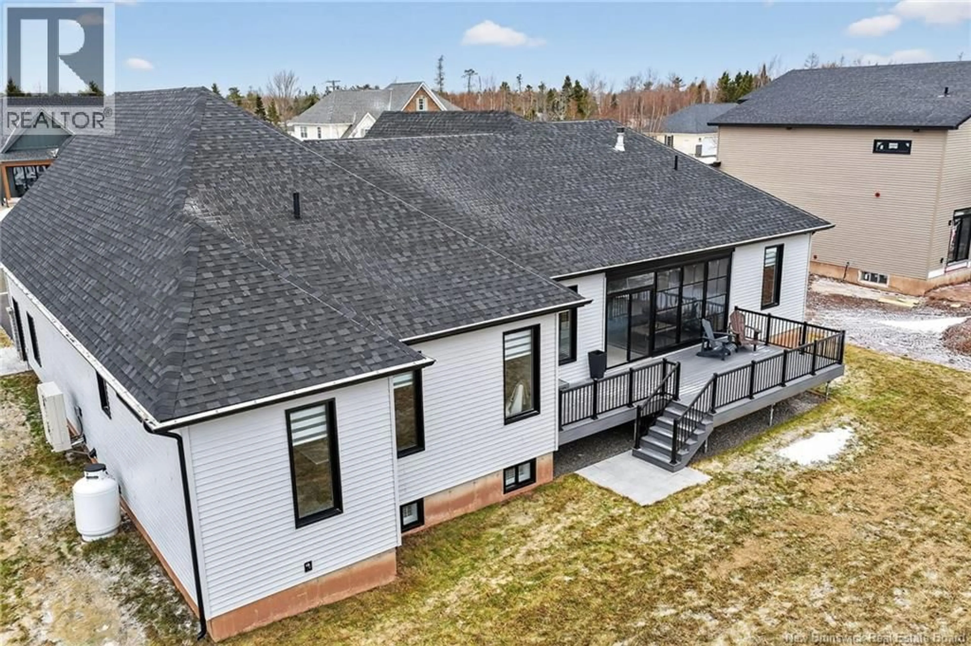 A pic from outside/outdoor area/front of a property/back of a property/a pic from drone, unknown for 83 ROYAL OAKS, Moncton New Brunswick E1H2P7