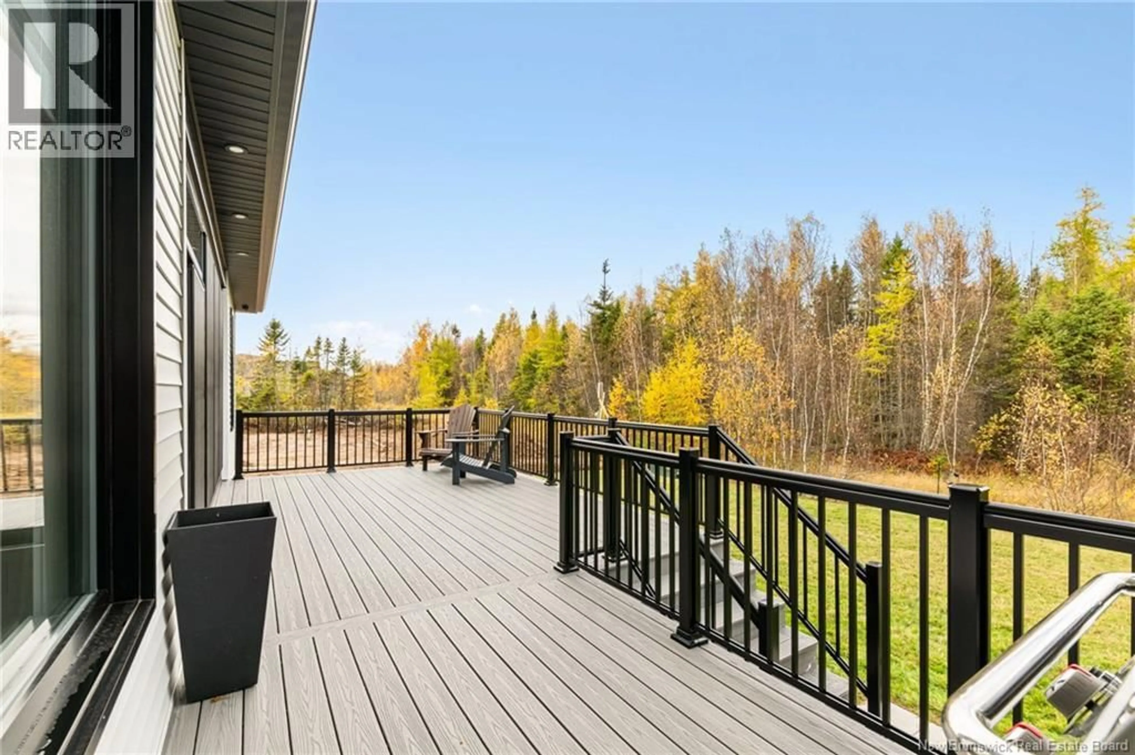 Patio, forest/trees view for 83 ROYAL OAKS, Moncton New Brunswick E1H2P7