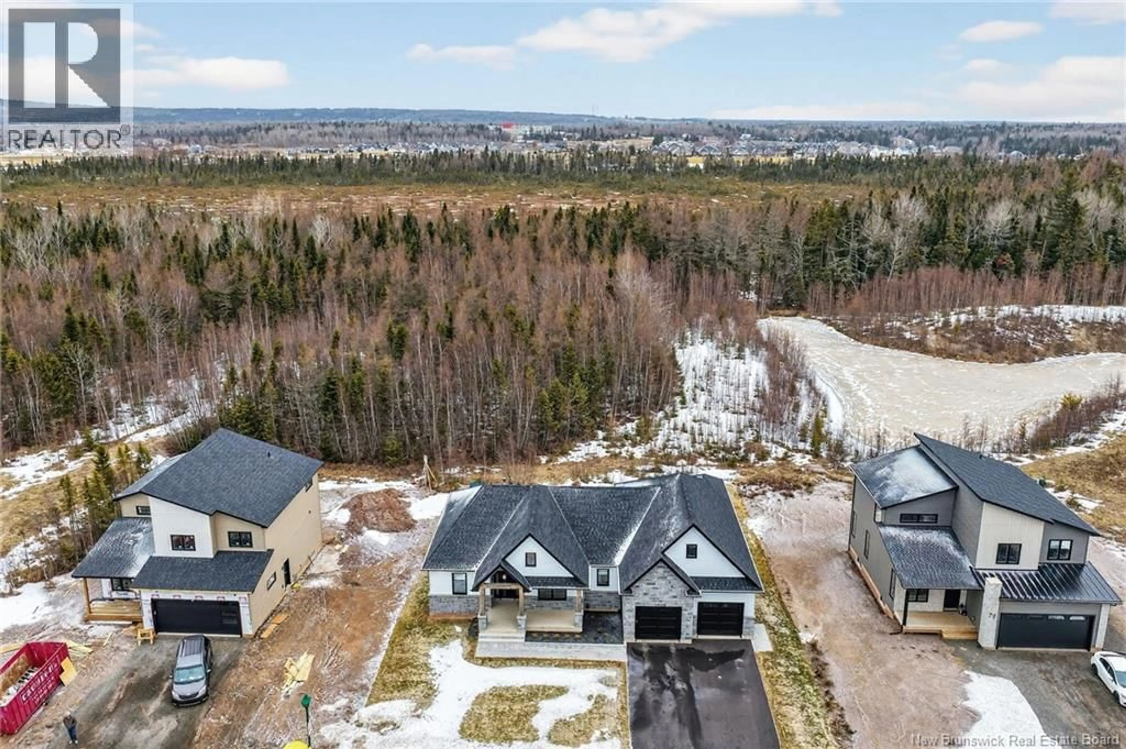 A pic from outside/outdoor area/front of a property/back of a property/a pic from drone, mountain view for 83 ROYAL OAKS, Moncton New Brunswick E1H2P7