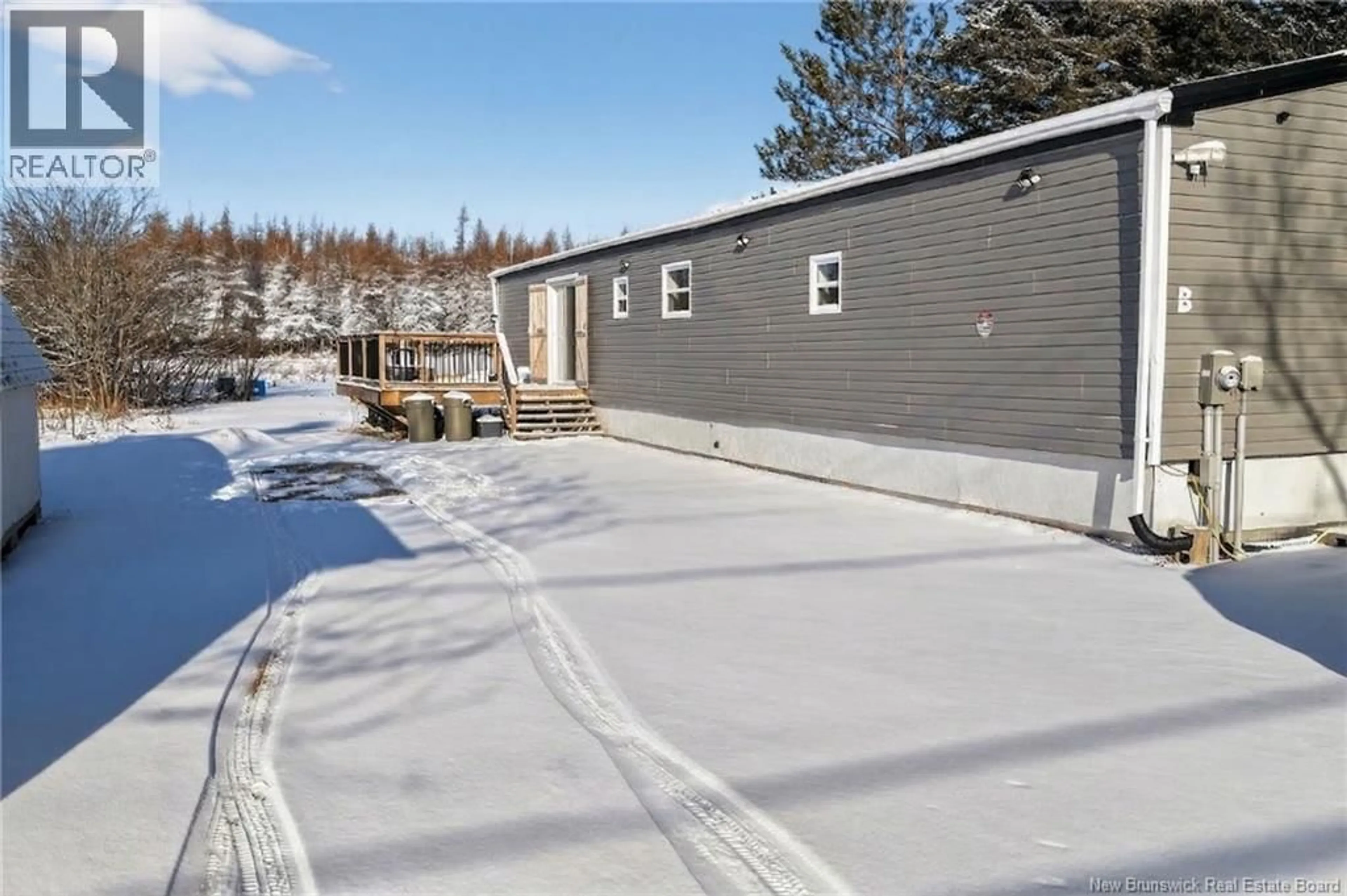 A pic from outside/outdoor area/front of a property/back of a property/a pic from drone, street for 3351 ROUTE 132, Scoudouc New Brunswick E4P3S1