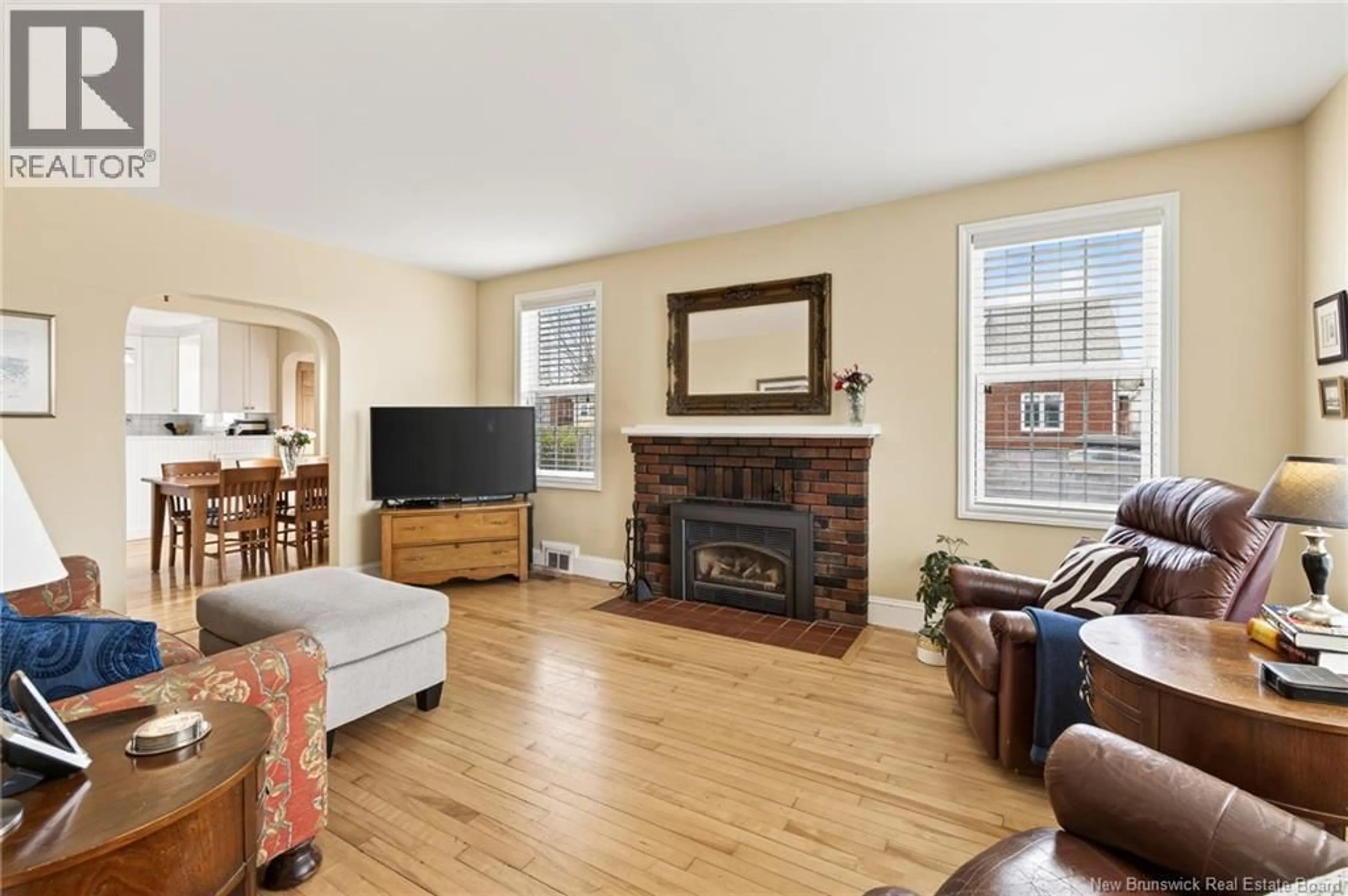 Living room with furniture, wood/laminate floor for 60 MARJORIE STREET, Moncton New Brunswick E1C2X1