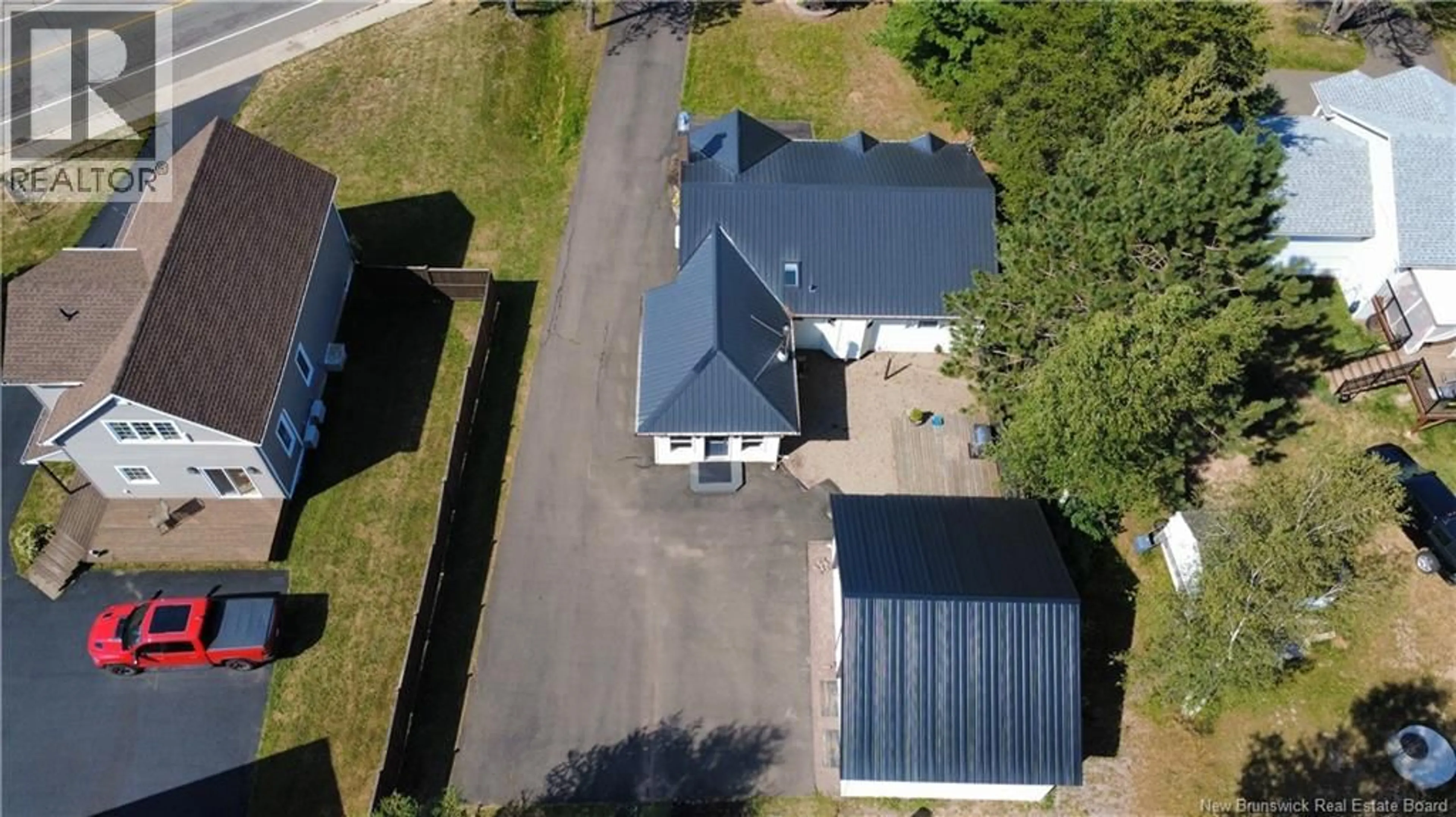 A pic from outside/outdoor area/front of a property/back of a property/a pic from drone, street for 1828 AMIRAULT STREET, Dieppe New Brunswick E1A7J8