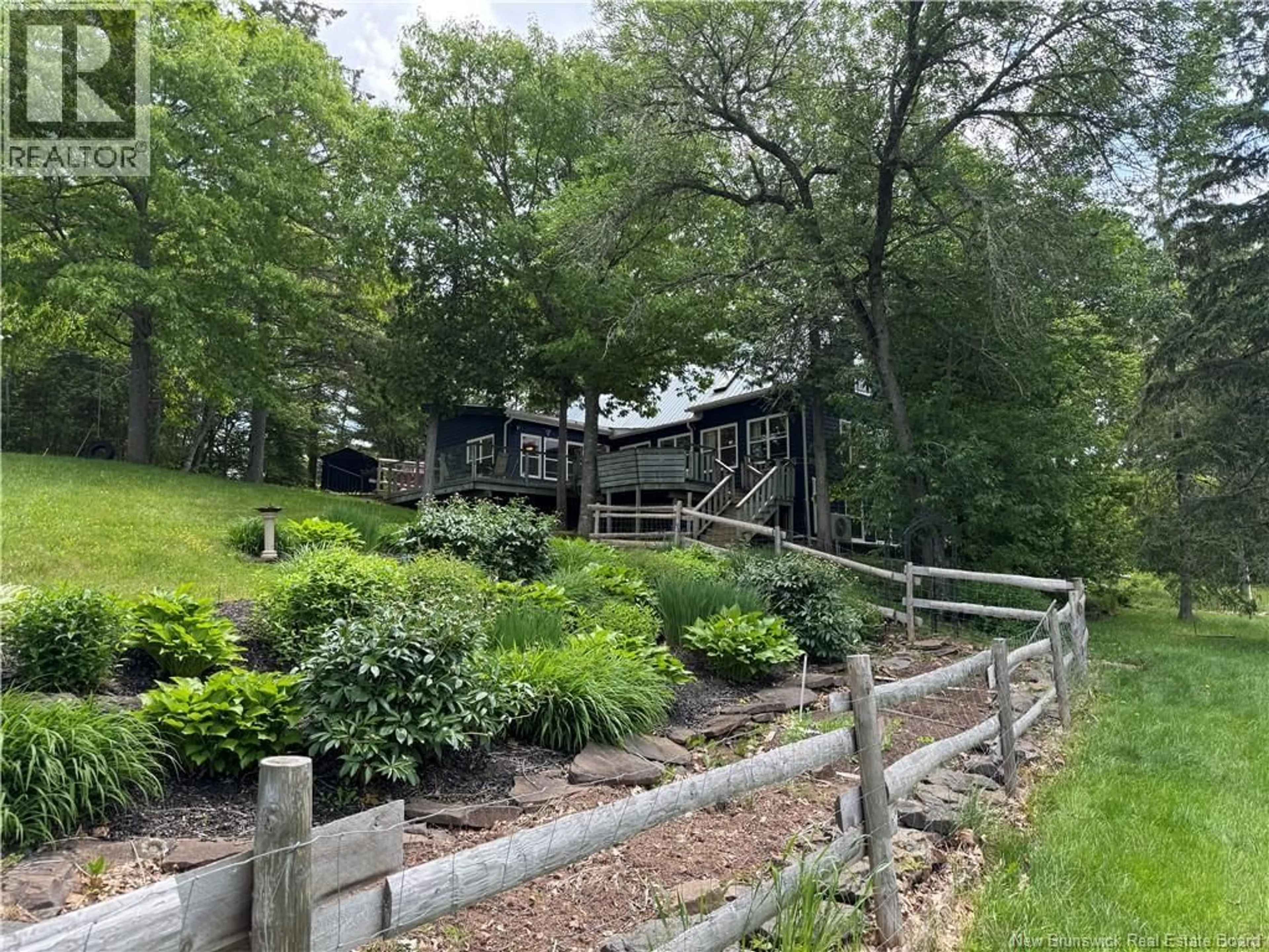 A pic from outside/outdoor area/front of a property/back of a property/a pic from drone, forest/trees view for 1588 SCENIC NARROWS BOULEVARD, Cambridge-Narrows New Brunswick E4C2P2