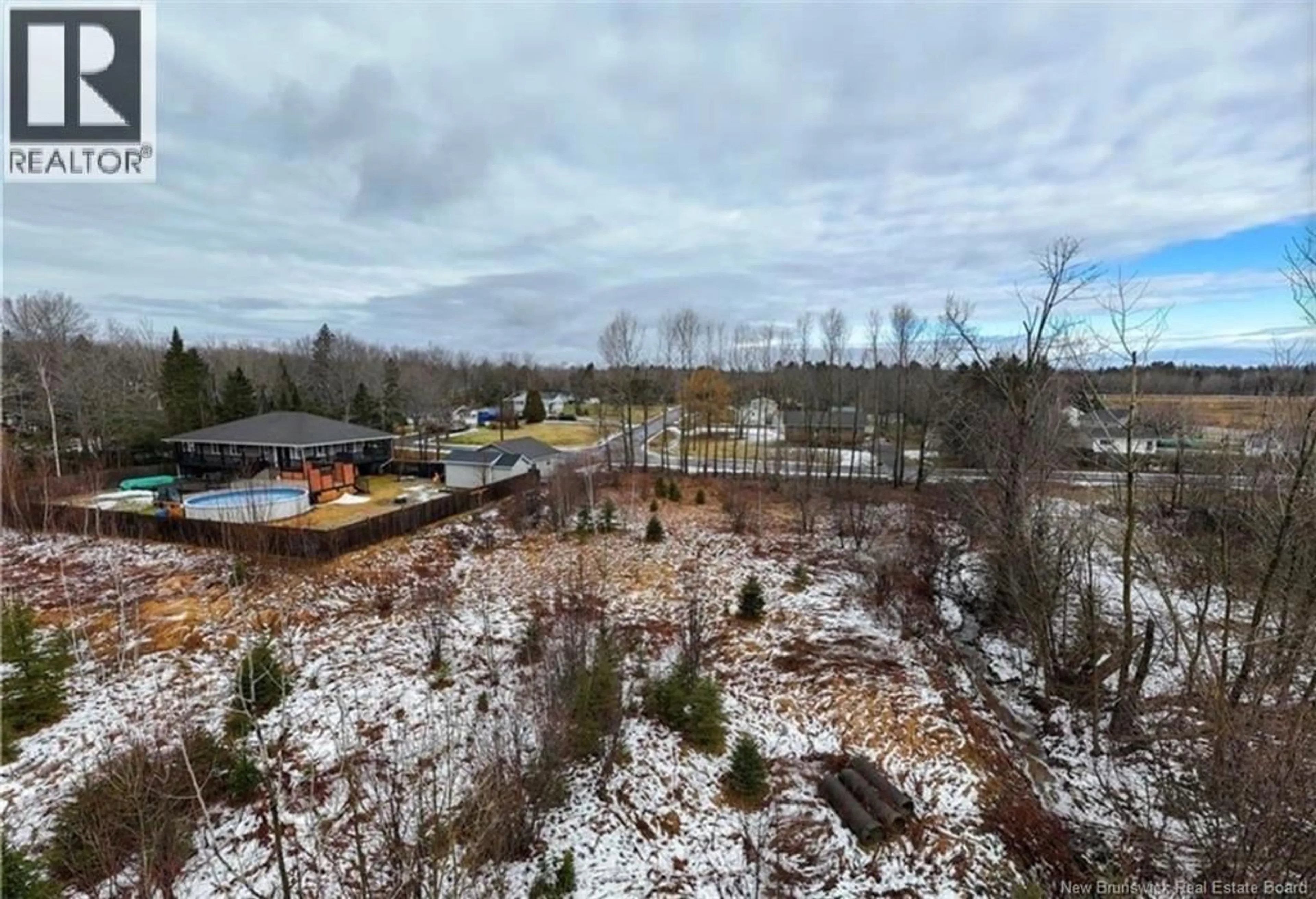 A pic from outside/outdoor area/front of a property/back of a property/a pic from drone, forest/trees view for 1A IRVINE STREET, Oromocto New Brunswick E2V3N4