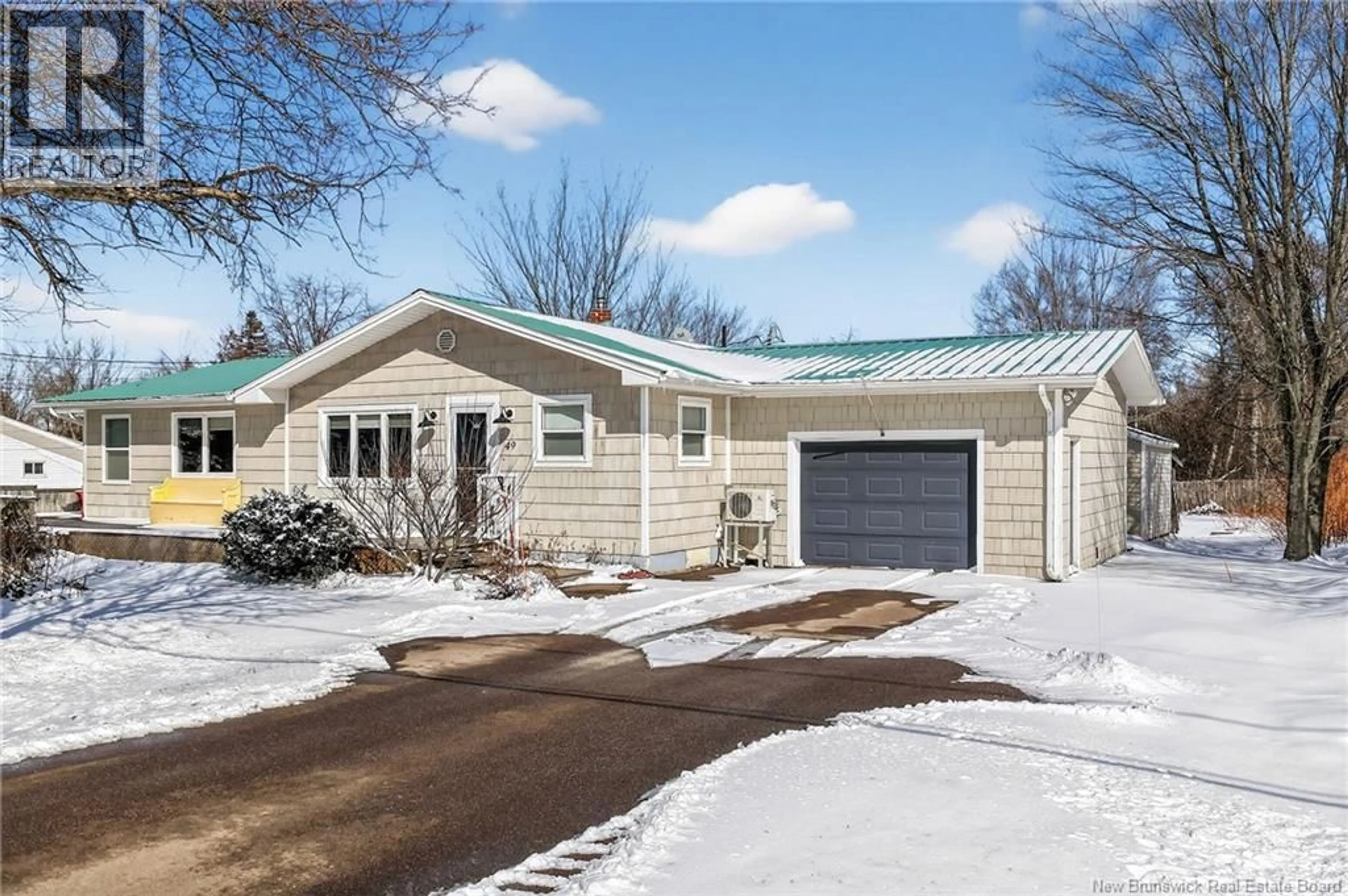 Home with vinyl exterior material, street for 49 BEAU RIVAGE STREET, Cap-Pelé New Brunswick E4N1M5