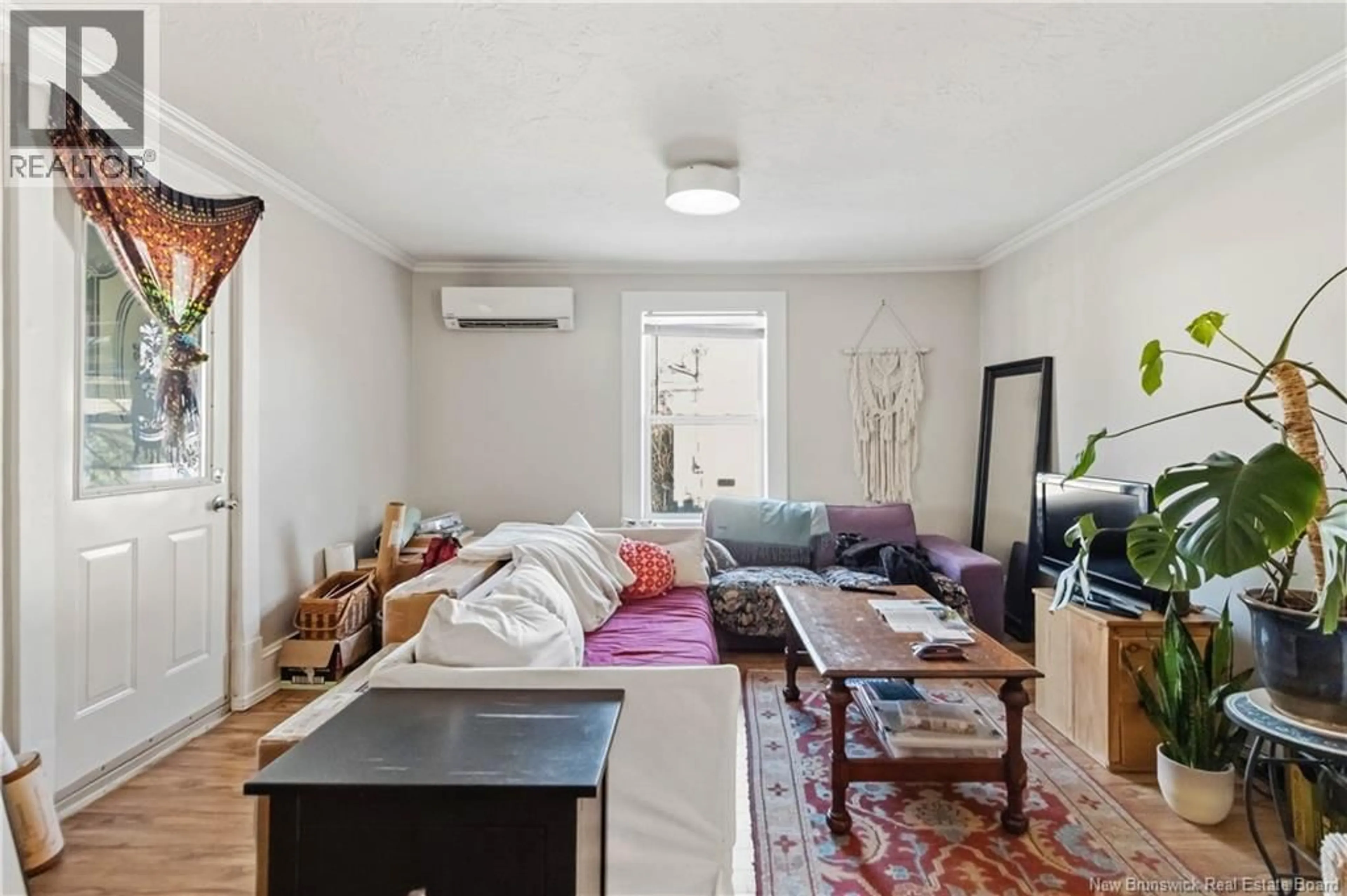 Living room with furniture, unknown for 97-99 EDWARD STREET, Moncton New Brunswick E1A2J3