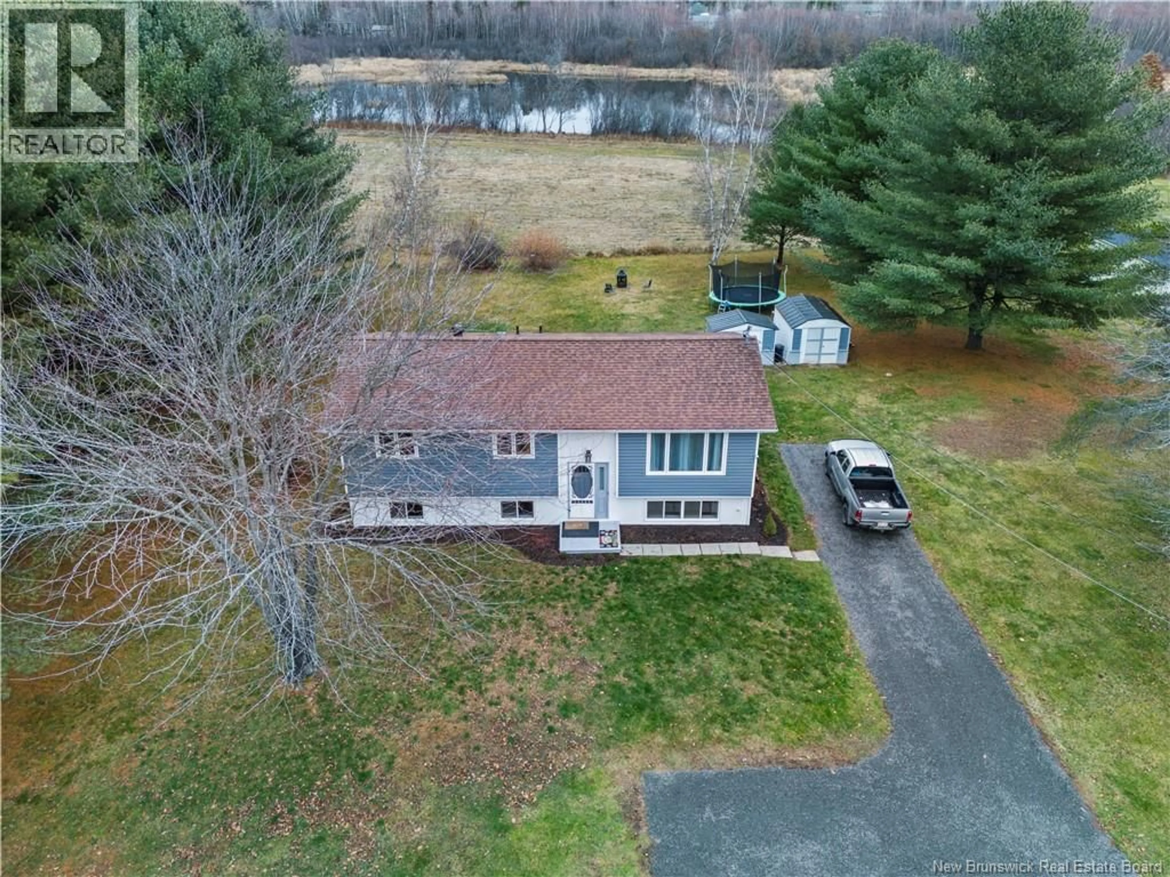 A pic from outside/outdoor area/front of a property/back of a property/a pic from drone, water/lake/river/ocean view for 929 RIVERSIDE DRIVE, Fredericton New Brunswick E3A8P9