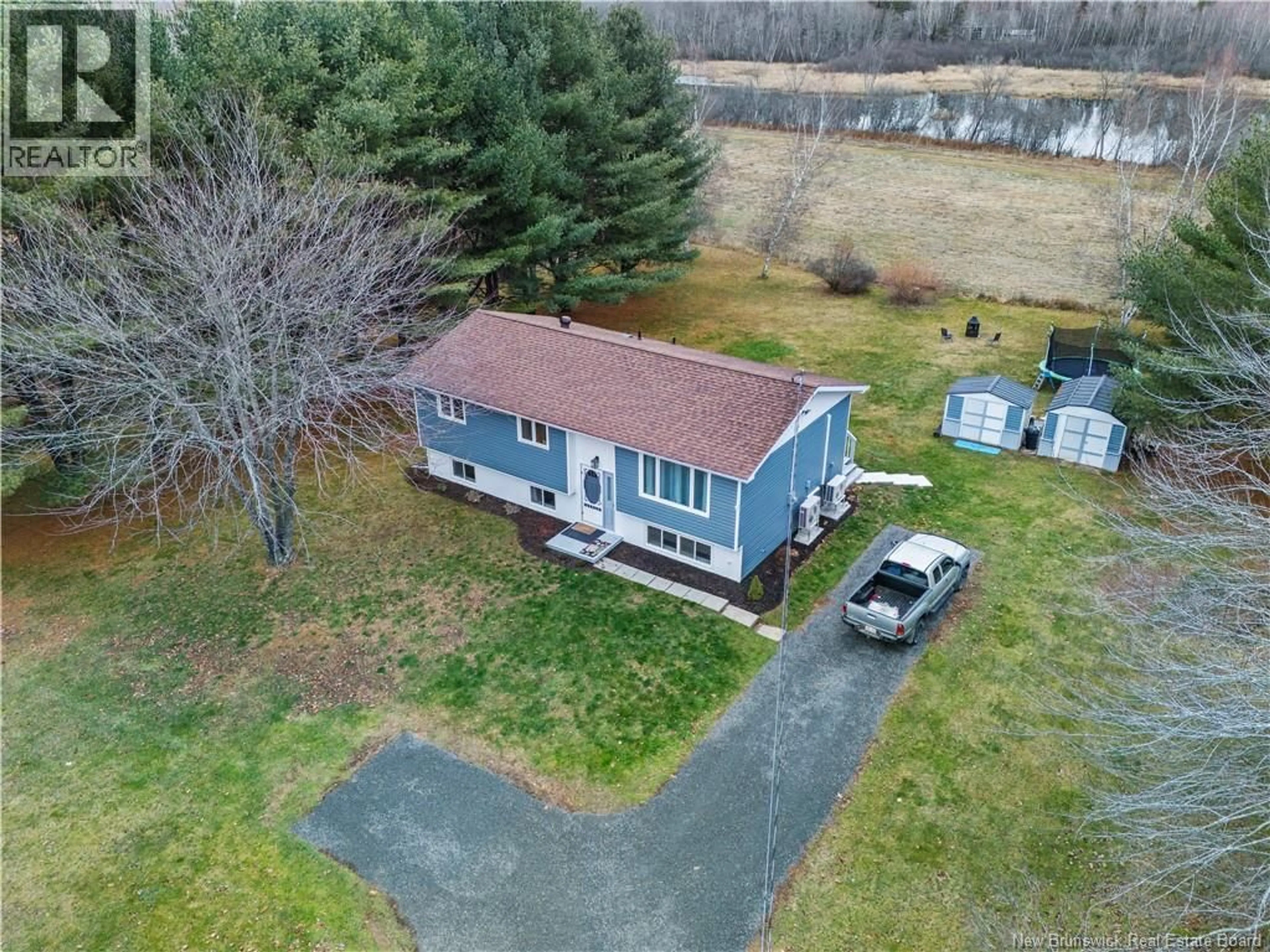 A pic from outside/outdoor area/front of a property/back of a property/a pic from drone, unknown for 929 RIVERSIDE DRIVE, Fredericton New Brunswick E3A8P9