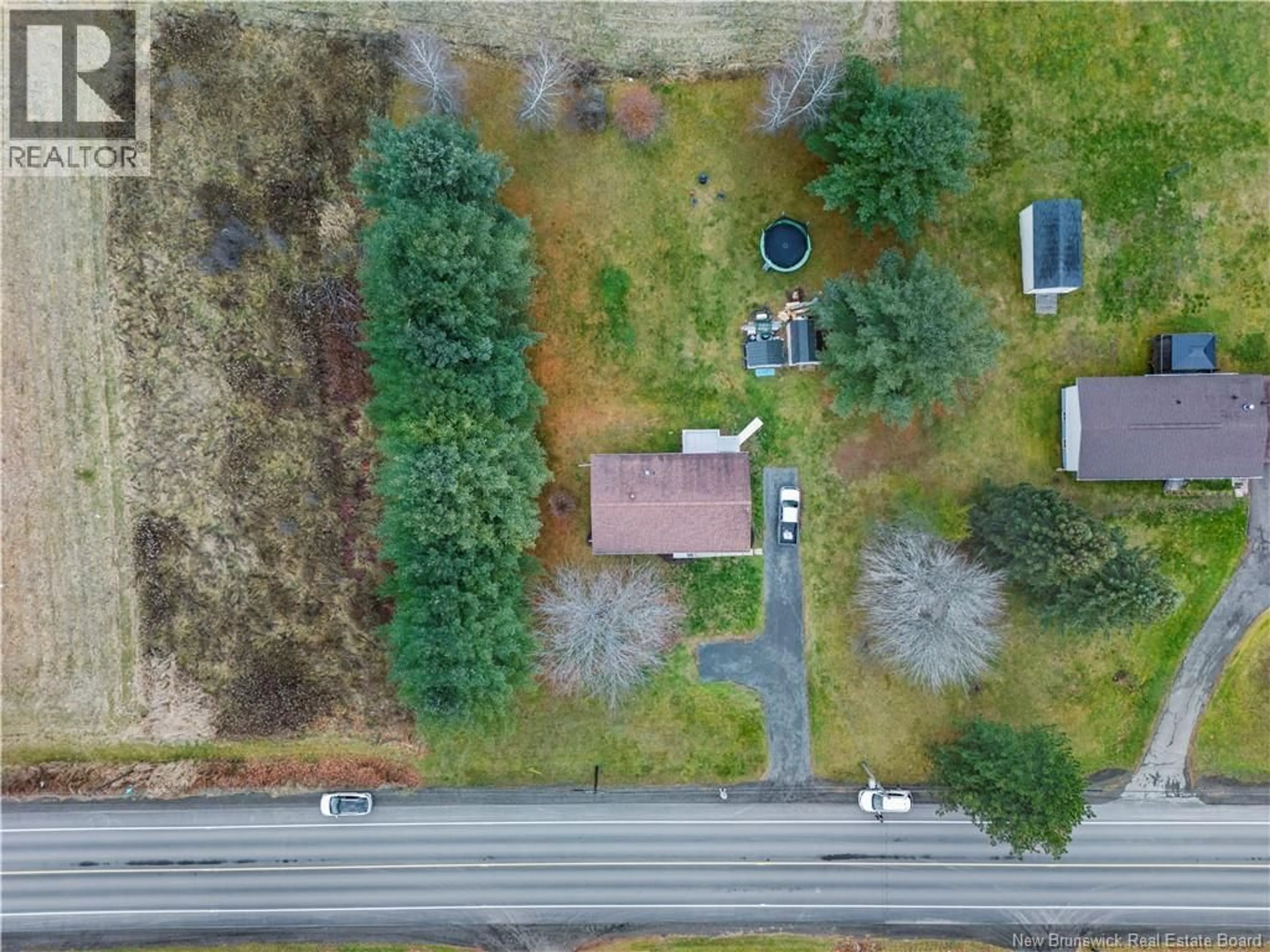 A pic from outside/outdoor area/front of a property/back of a property/a pic from drone, street for 929 RIVERSIDE DRIVE, Fredericton New Brunswick E3A8P9
