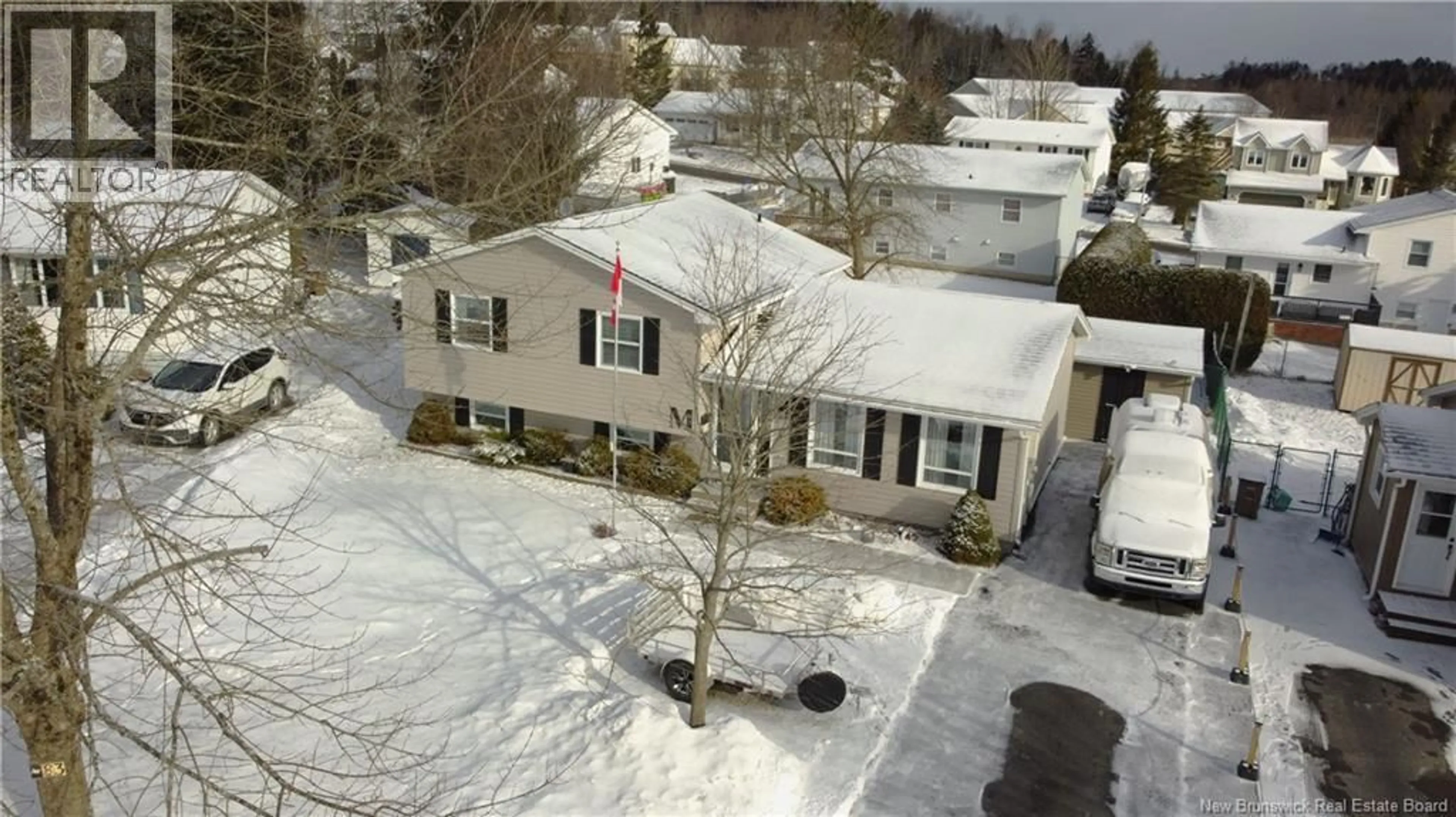 A pic from outside/outdoor area/front of a property/back of a property/a pic from drone, unknown for 83 MOUNTFIELD CRESCENT, Saint John New Brunswick E2M5R4