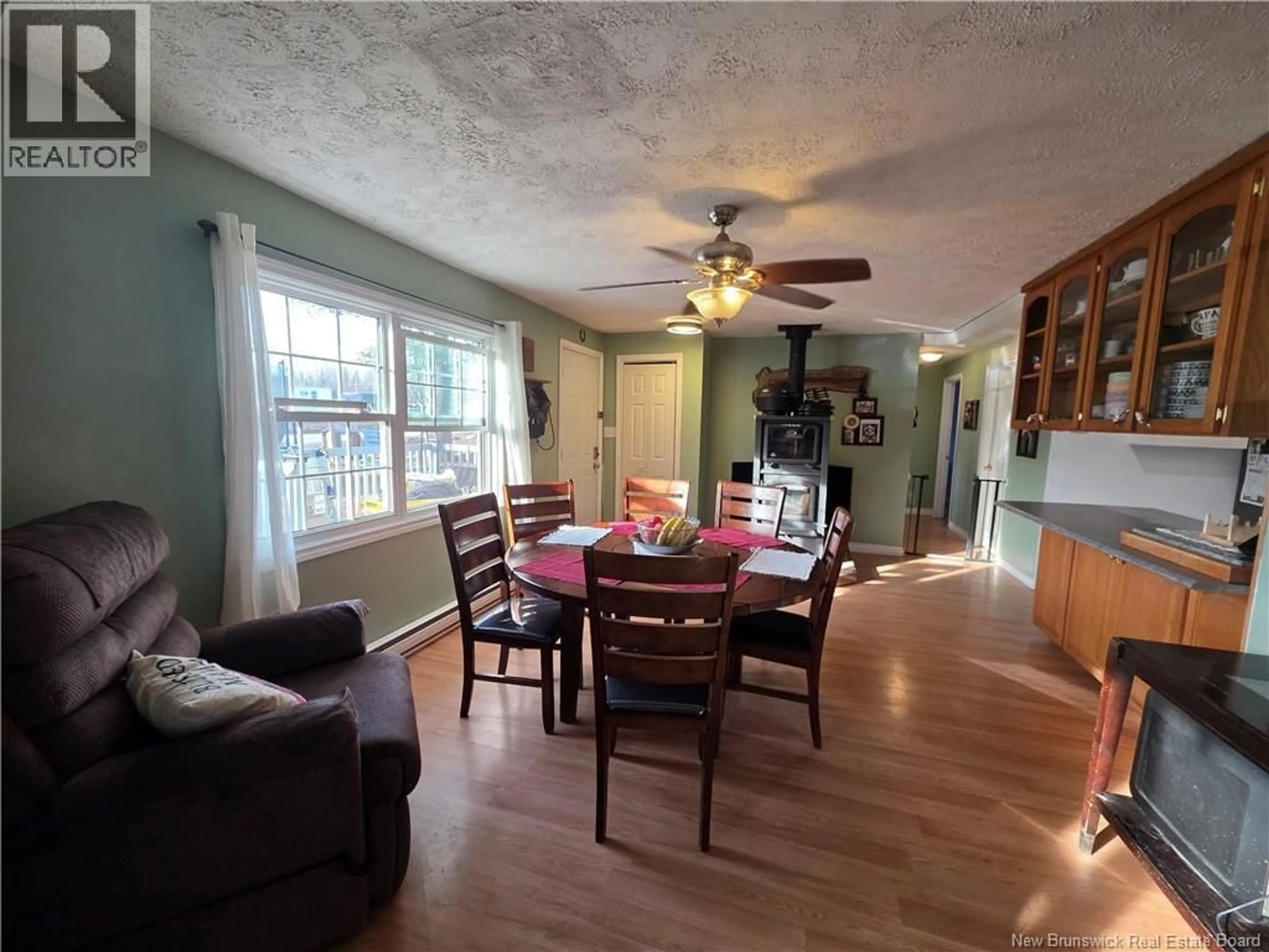 Dining room, wood/laminate floor for 144 WILSEY ROAD, Fredericton Junction New Brunswick E5L1W9