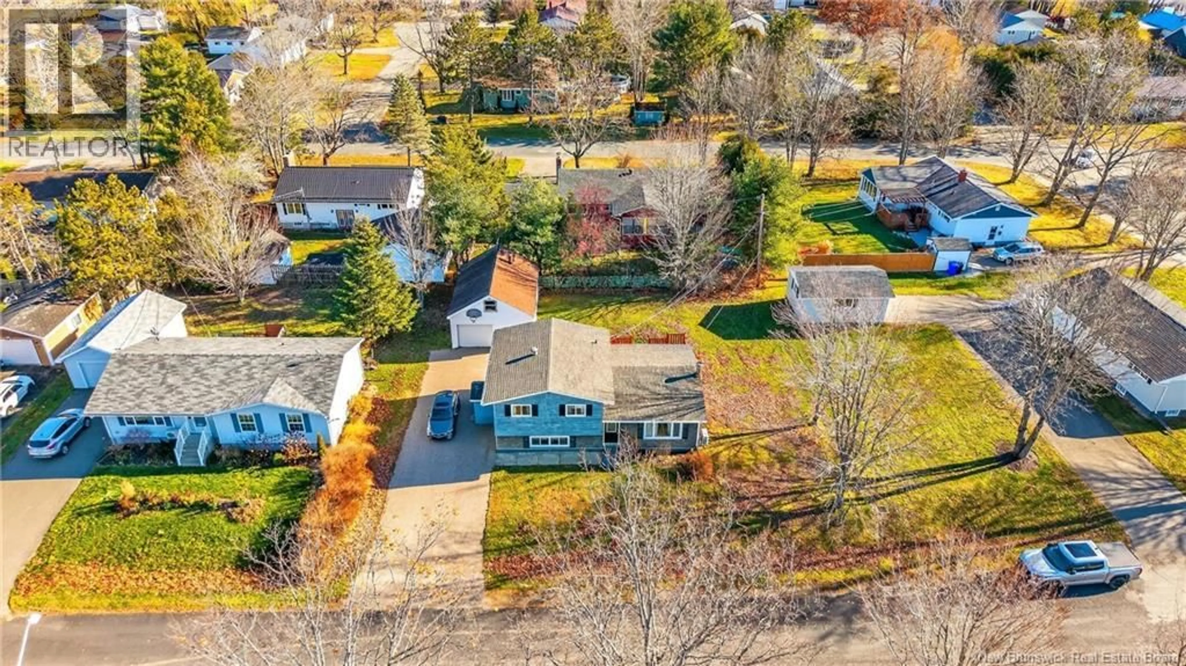 A pic from outside/outdoor area/front of a property/back of a property/a pic from drone, street for 1 ABBOTT STREET, St. Stephen New Brunswick E3L3A8