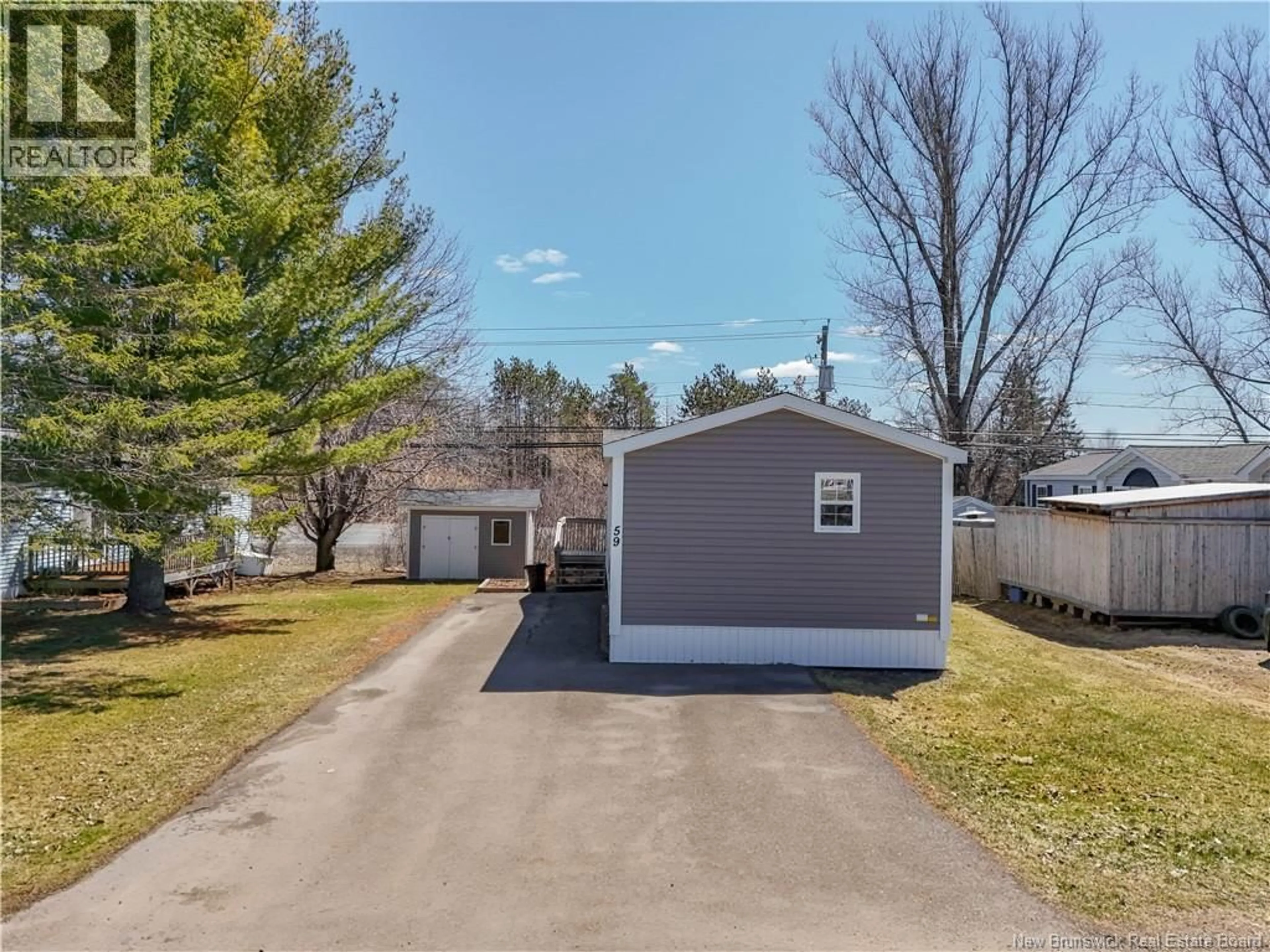A pic from outside/outdoor area/front of a property/back of a property/a pic from drone, street for 59 HEDGEVIEW DRIVE, Fredericton New Brunswick E3B6R7