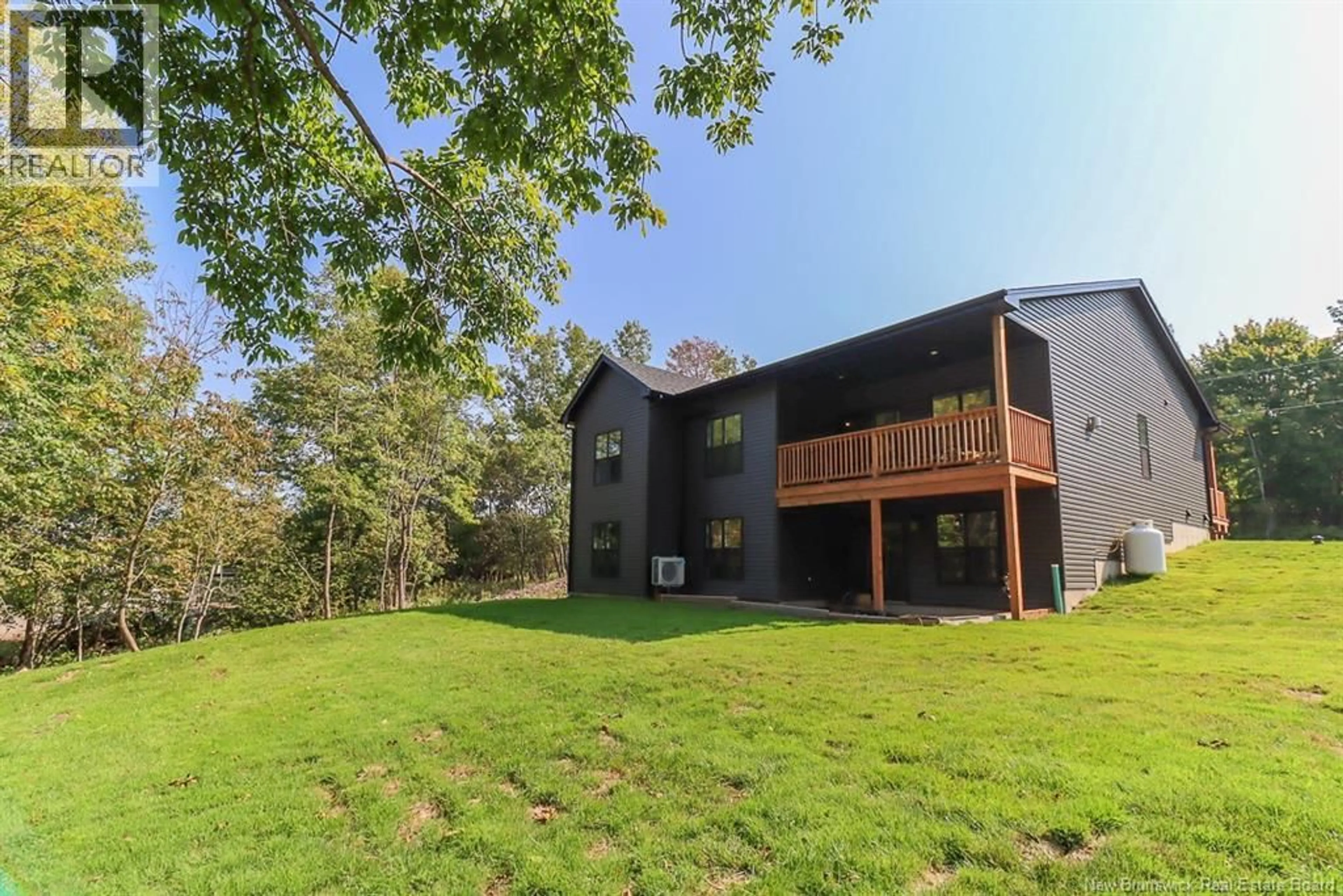 A pic from outside/outdoor area/front of a property/back of a property/a pic from drone, forest/trees view for 14 SHERATON AVENUE, Quispamsis New Brunswick E2E1L9