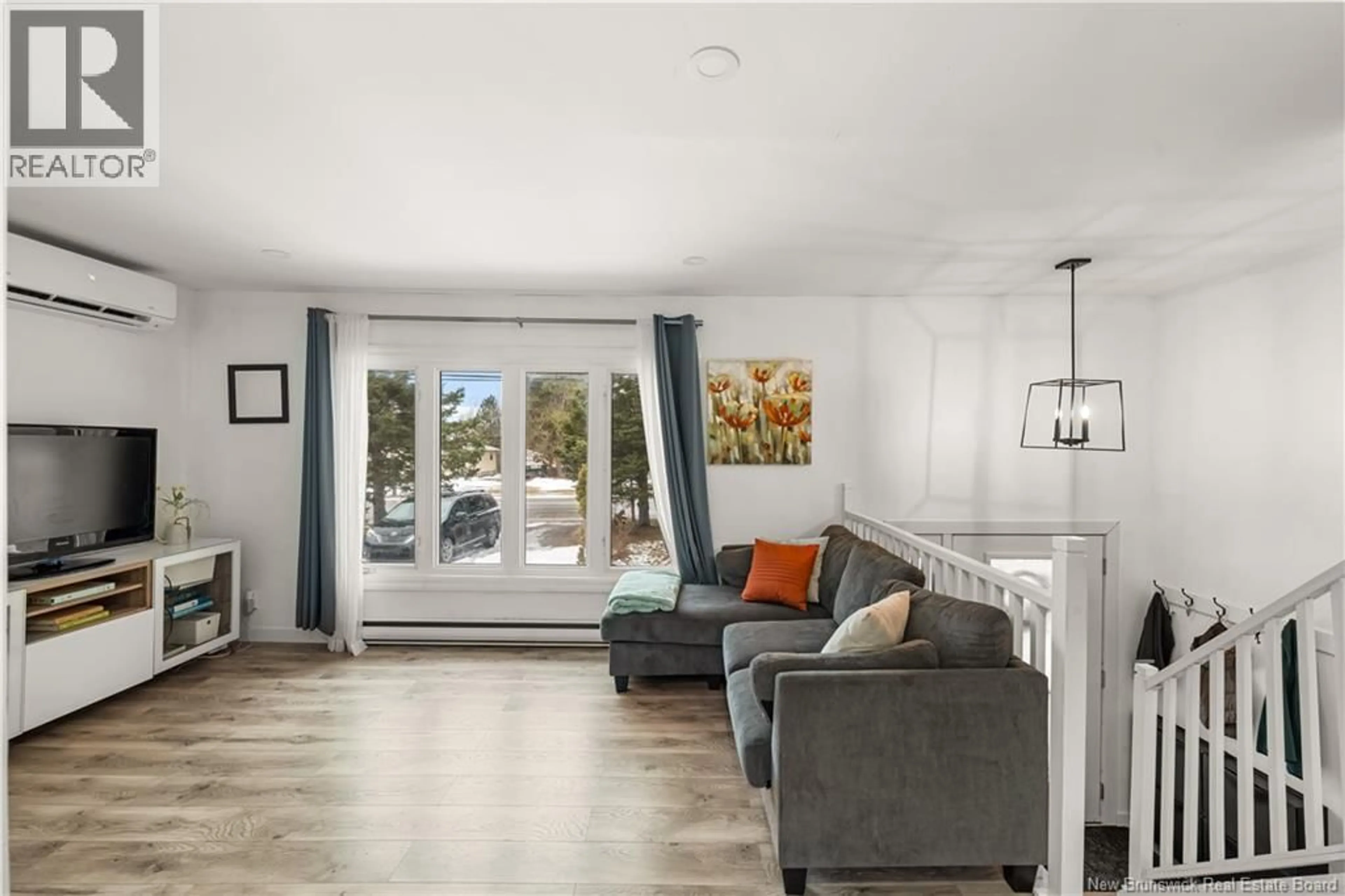 Living room with furniture, unknown for 857 MAPLETON ROAD, Moncton New Brunswick E1G2K6