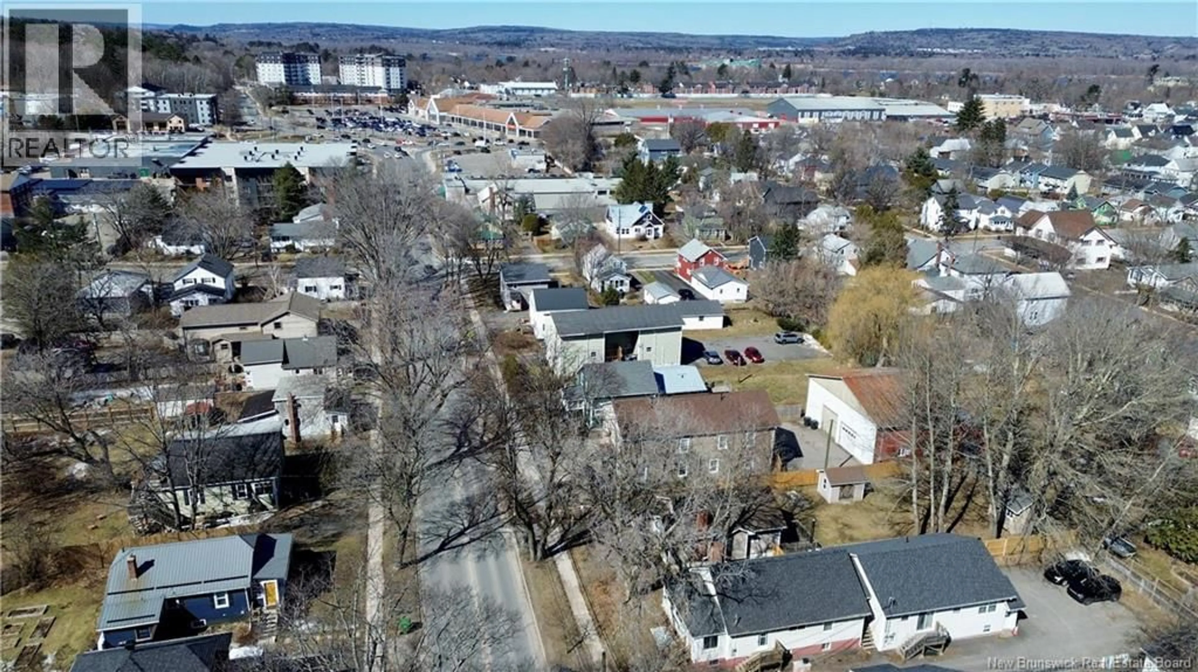 A pic from outside/outdoor area/front of a property/back of a property/a pic from drone, street for 253 DUNDONALD STREET, Fredericton New Brunswick E3B1X1