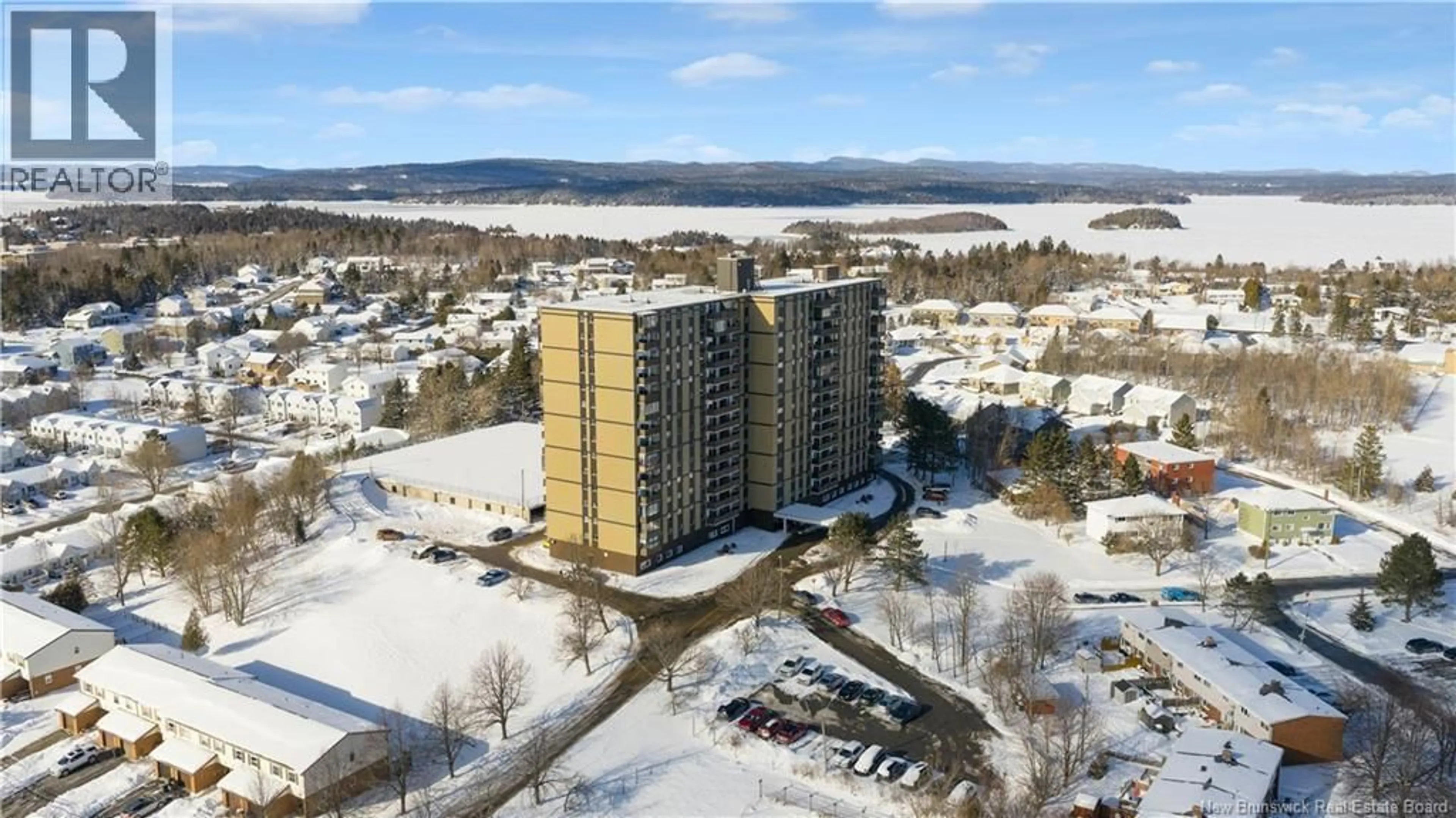 A pic from outside/outdoor area/front of a property/back of a property/a pic from drone, building for 1103 - 310 WOODWARD AVENUE, Saint John New Brunswick E2K2L1