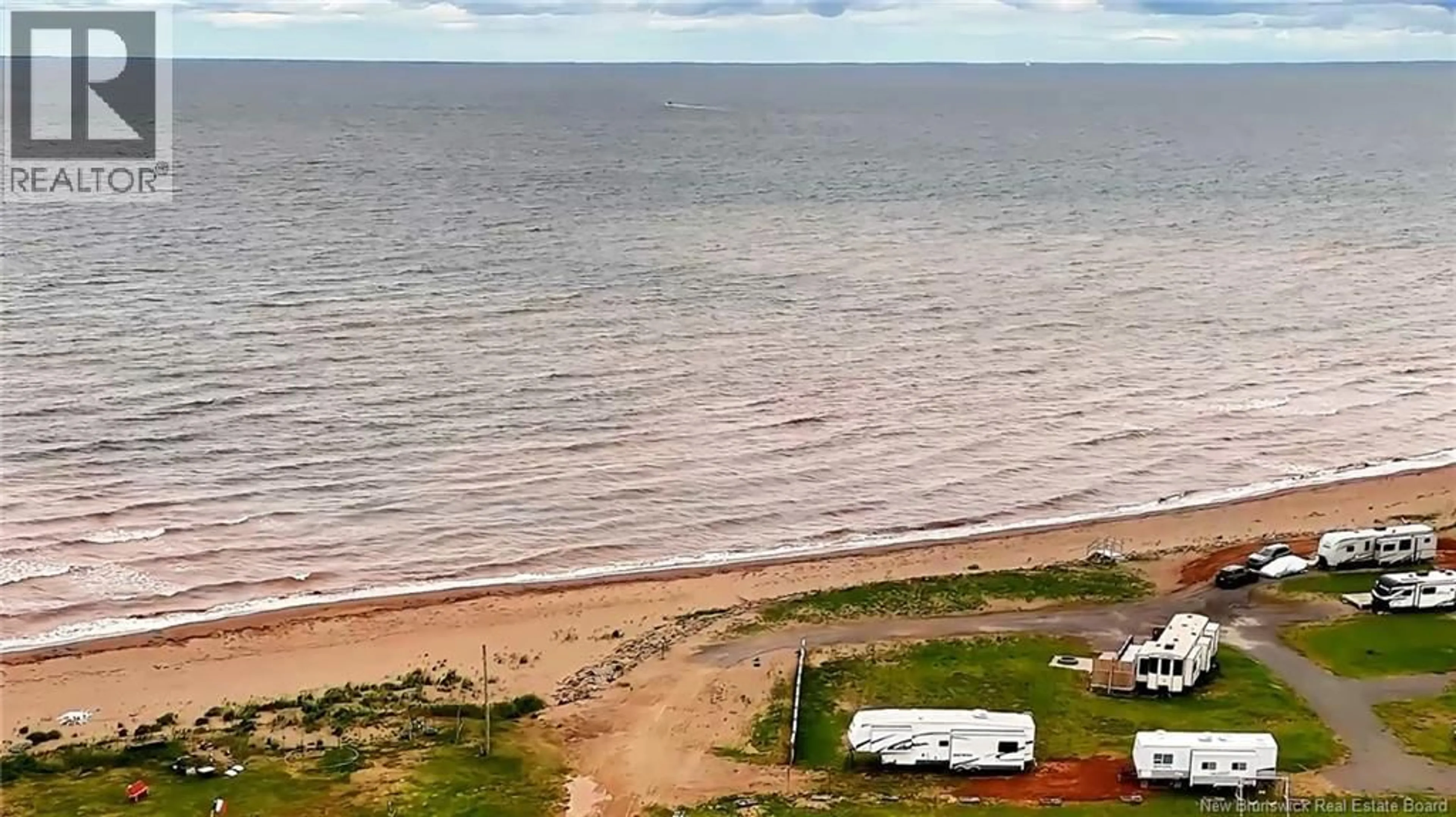 A pic from outside/outdoor area/front of a property/back of a property/a pic from drone, water/lake/river/ocean view for 17 LEO EMILE STREET, Petit-Cap New Brunswick E4N2G1