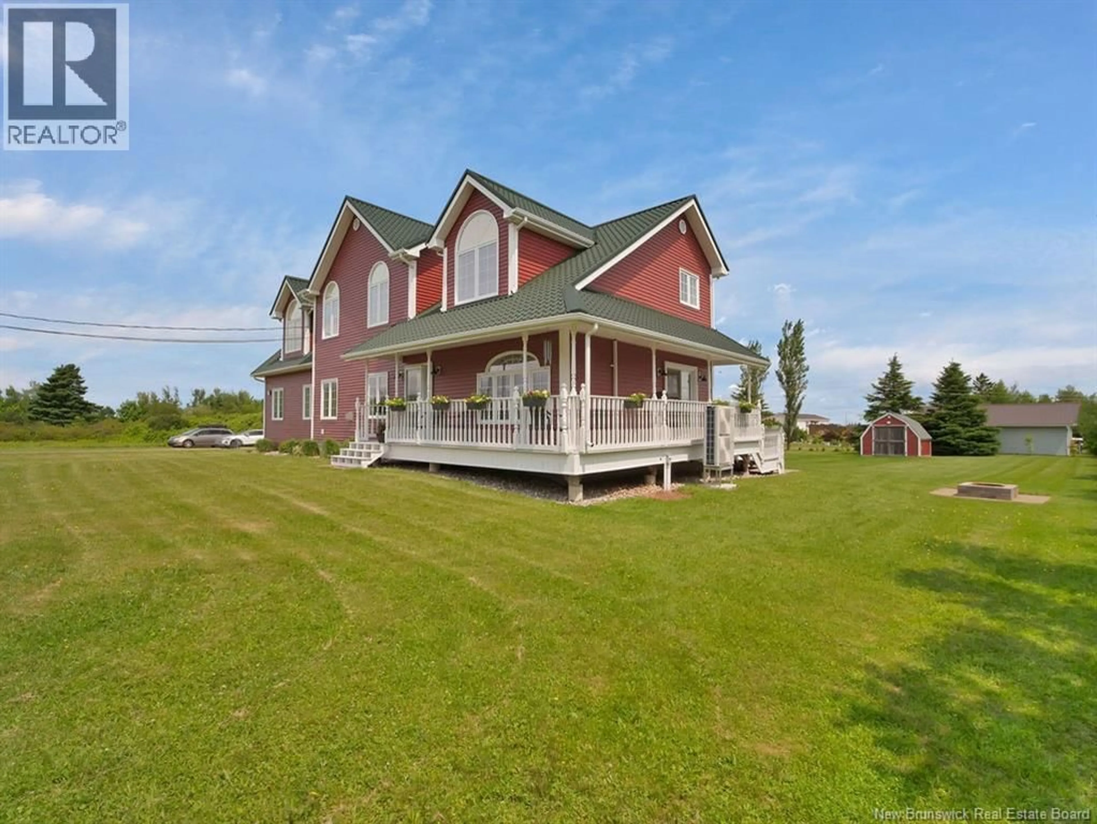 A pic from outside/outdoor area/front of a property/back of a property/a pic from drone, water/lake/river/ocean view for 17 LEO EMILE STREET, Petit-Cap New Brunswick E4N2G1