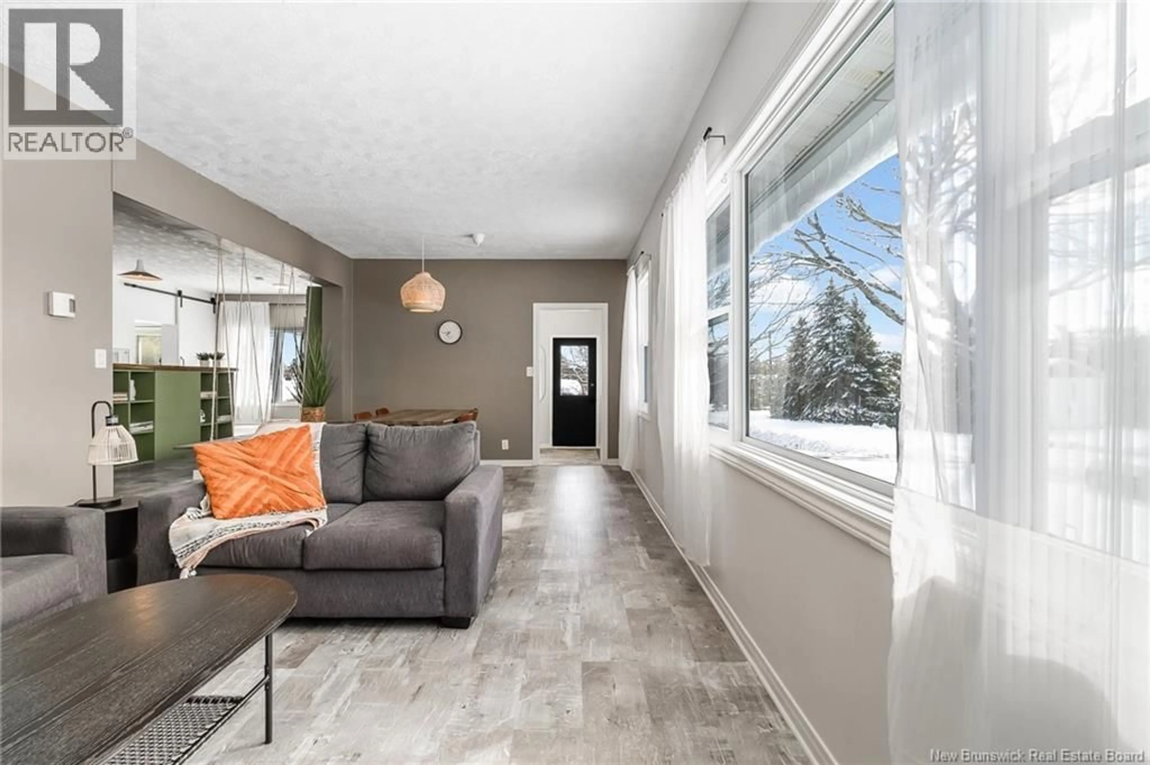 Living room with furniture, ceramic/tile floor for 39 NORWOOD ROAD, Gagetown New Brunswick E5M1J3