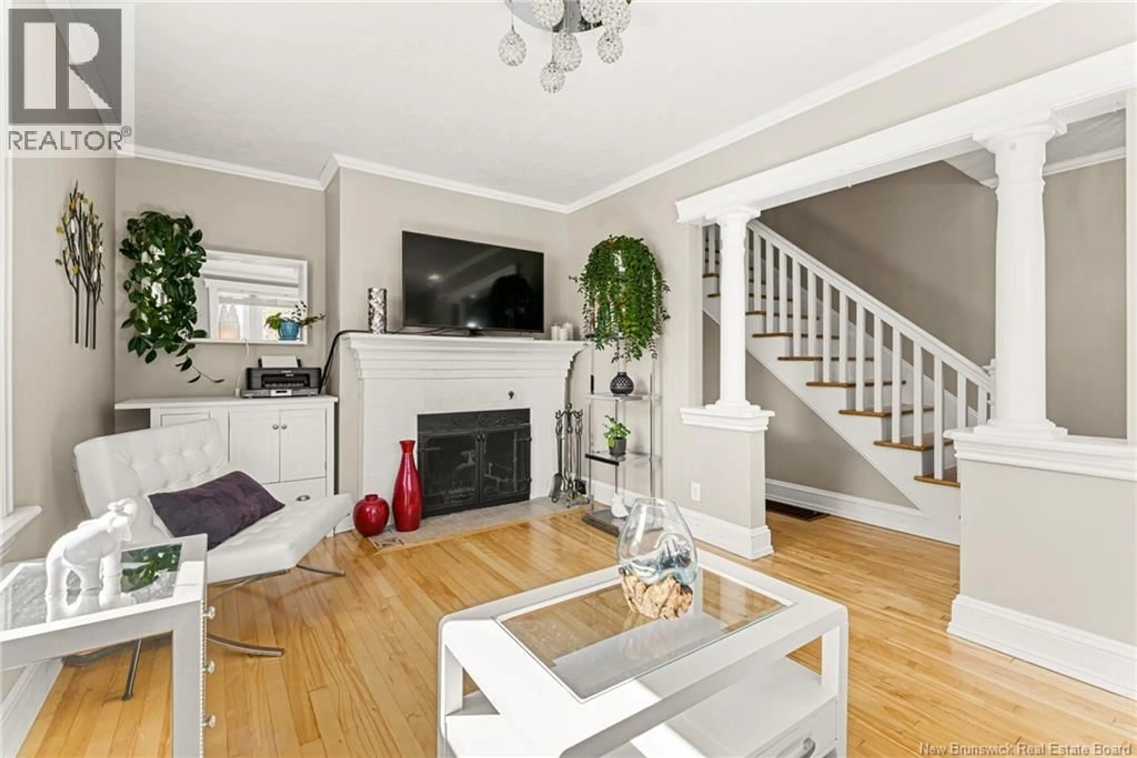 Living room with furniture, wood/laminate floor for 20-22 SIXTH STREET, Moncton New Brunswick E1E3G6