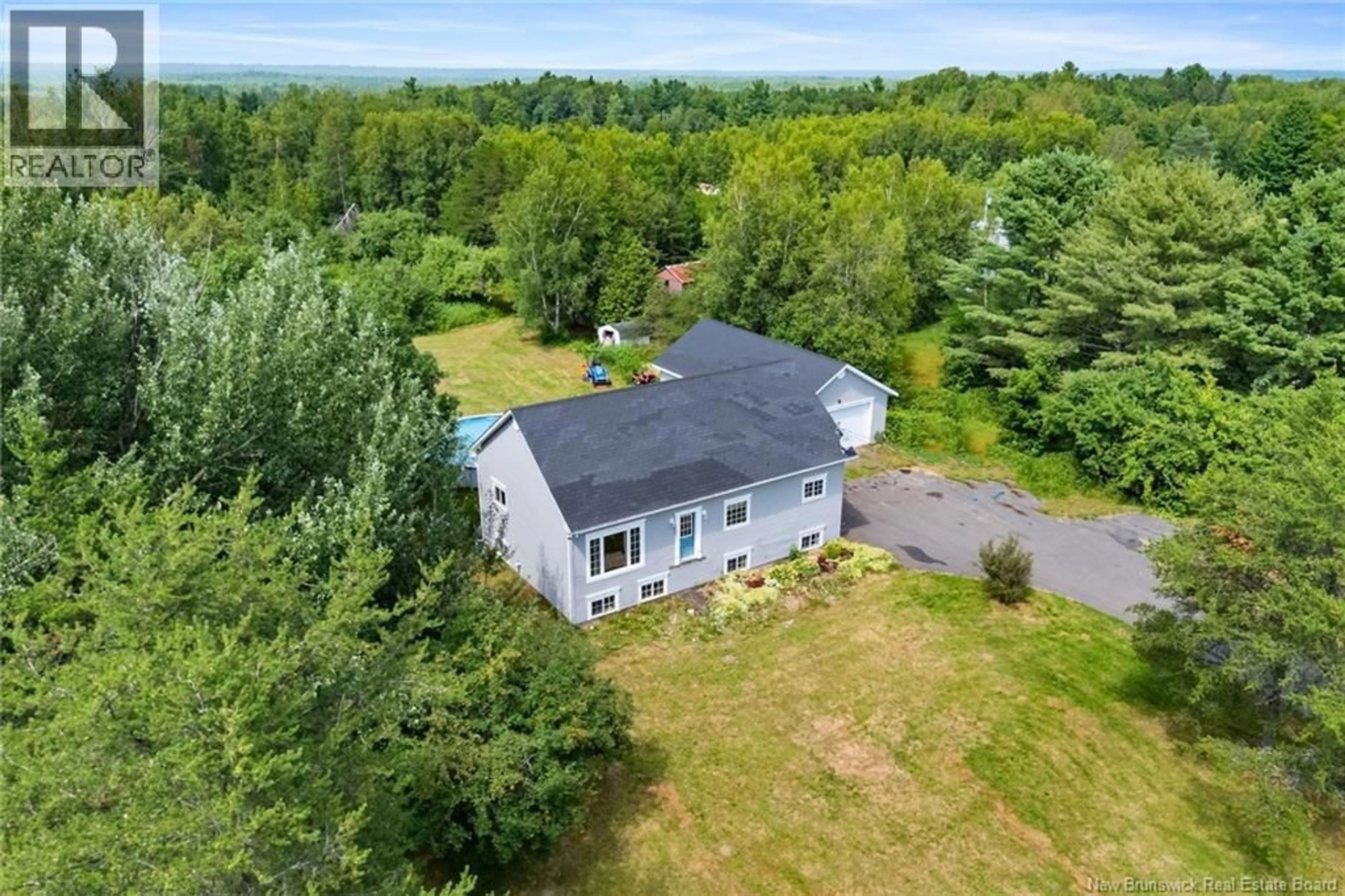 A pic from outside/outdoor area/front of a property/back of a property/a pic from drone, water/lake/river/ocean view for 4325 ROUTE 10, New Zion New Brunswick E4B1A5