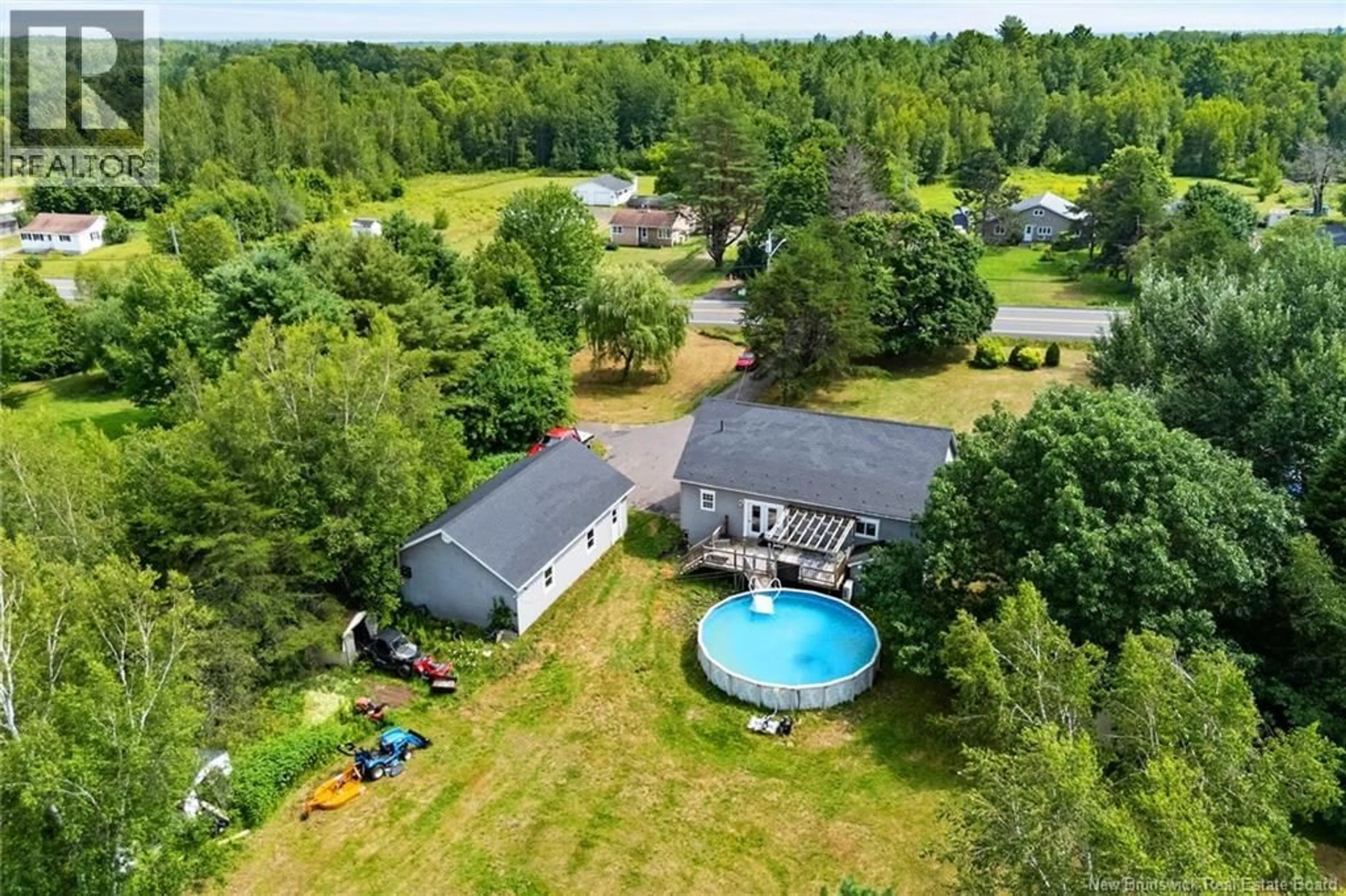 A pic from outside/outdoor area/front of a property/back of a property/a pic from drone, water/lake/river/ocean view for 4325 ROUTE 10, New Zion New Brunswick E4B1A5