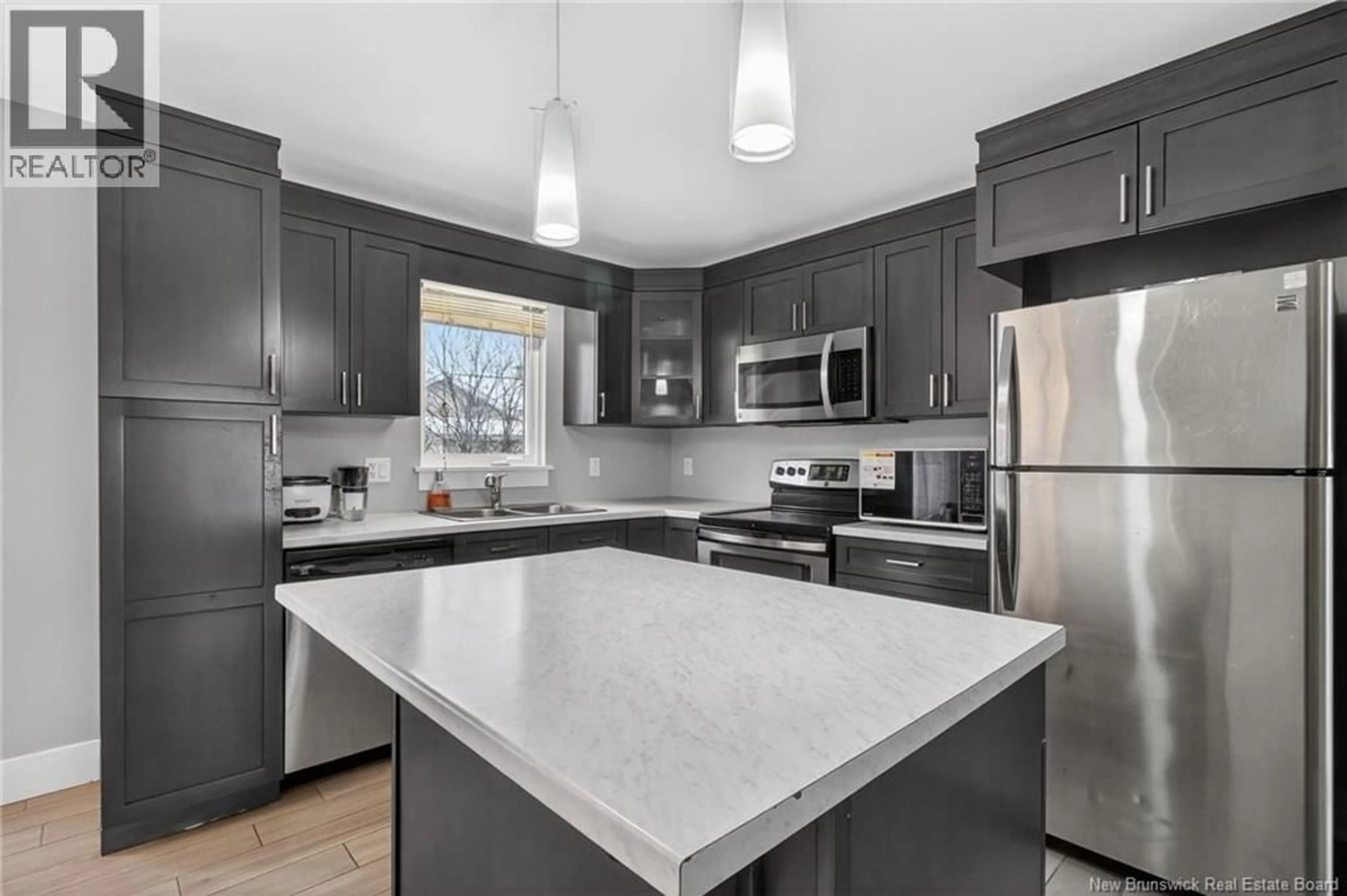 Open concept kitchen, ceramic/tile floor for 56 LANCEFIELD CRESCENT, Moncton New Brunswick E1E0E6