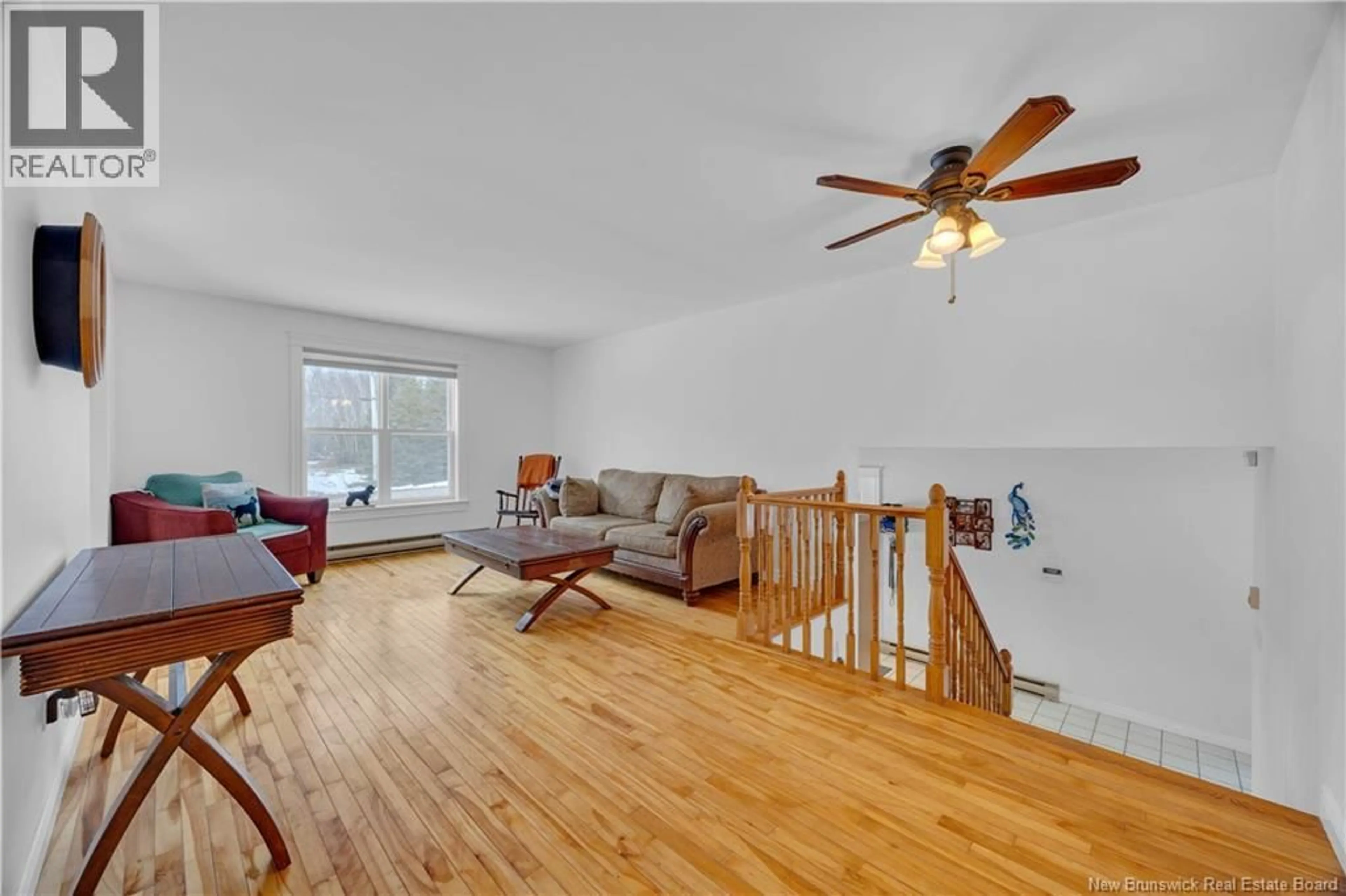 Living room with furniture, wood/laminate floor for 28 ORCHARD STREET, Passekeag New Brunswick E5N7R7