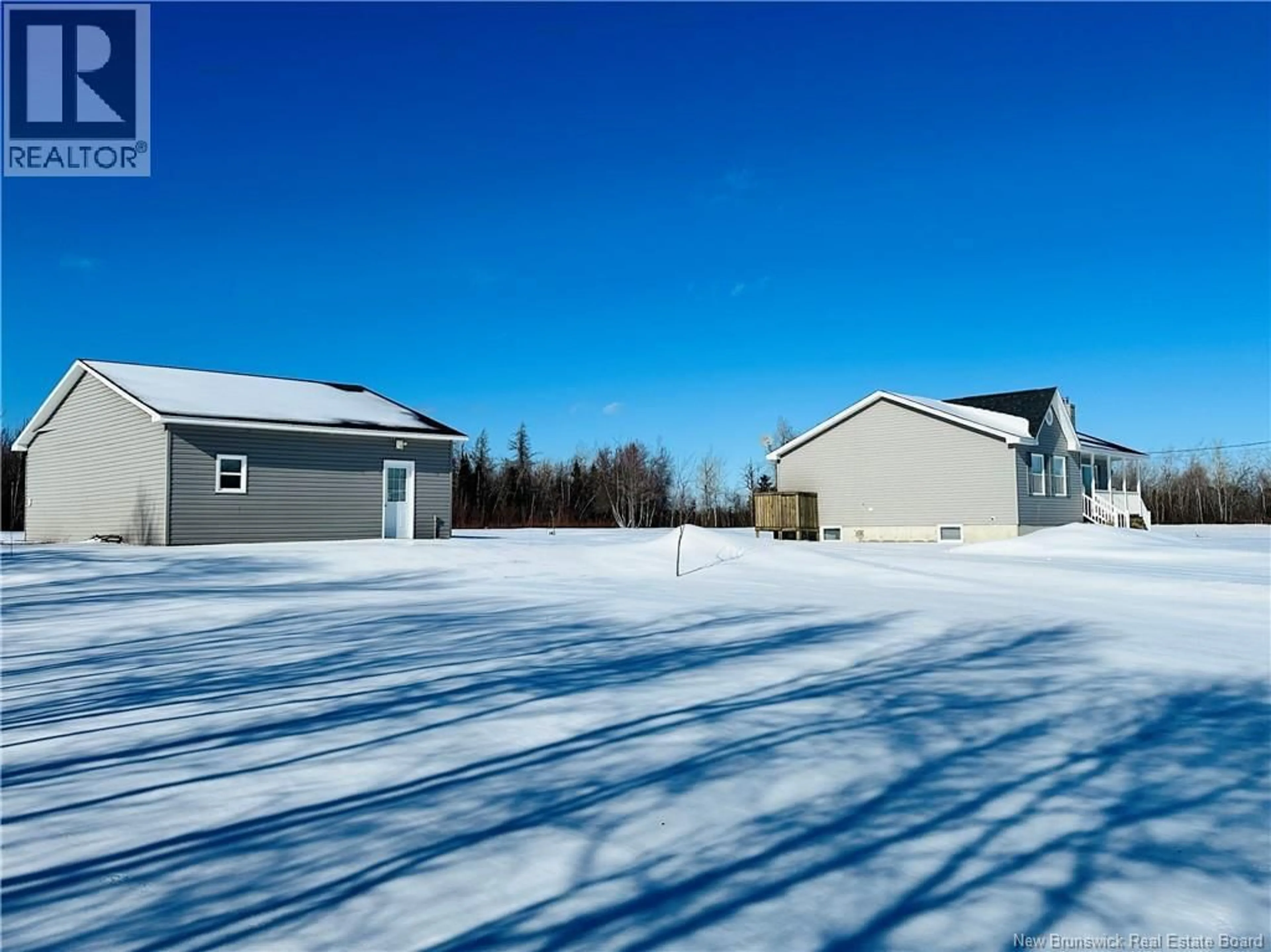 A pic from outside/outdoor area/front of a property/back of a property/a pic from drone, unknown for 8020 RTE 117 HWY, Black River Bridge New Brunswick E1N5K5