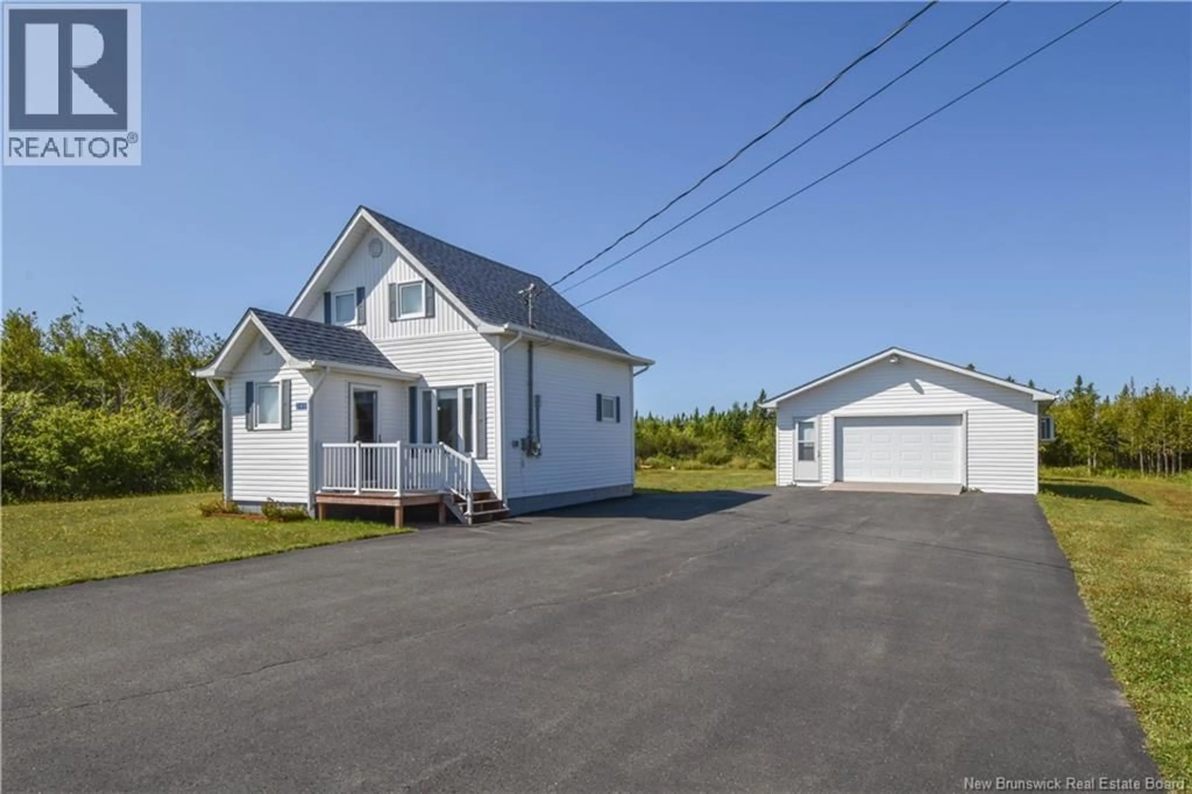 A pic from outside/outdoor area/front of a property/back of a property/a pic from drone, street for 2497 ROUTE 305, Cap-Bateau New Brunswick E8T3H7
