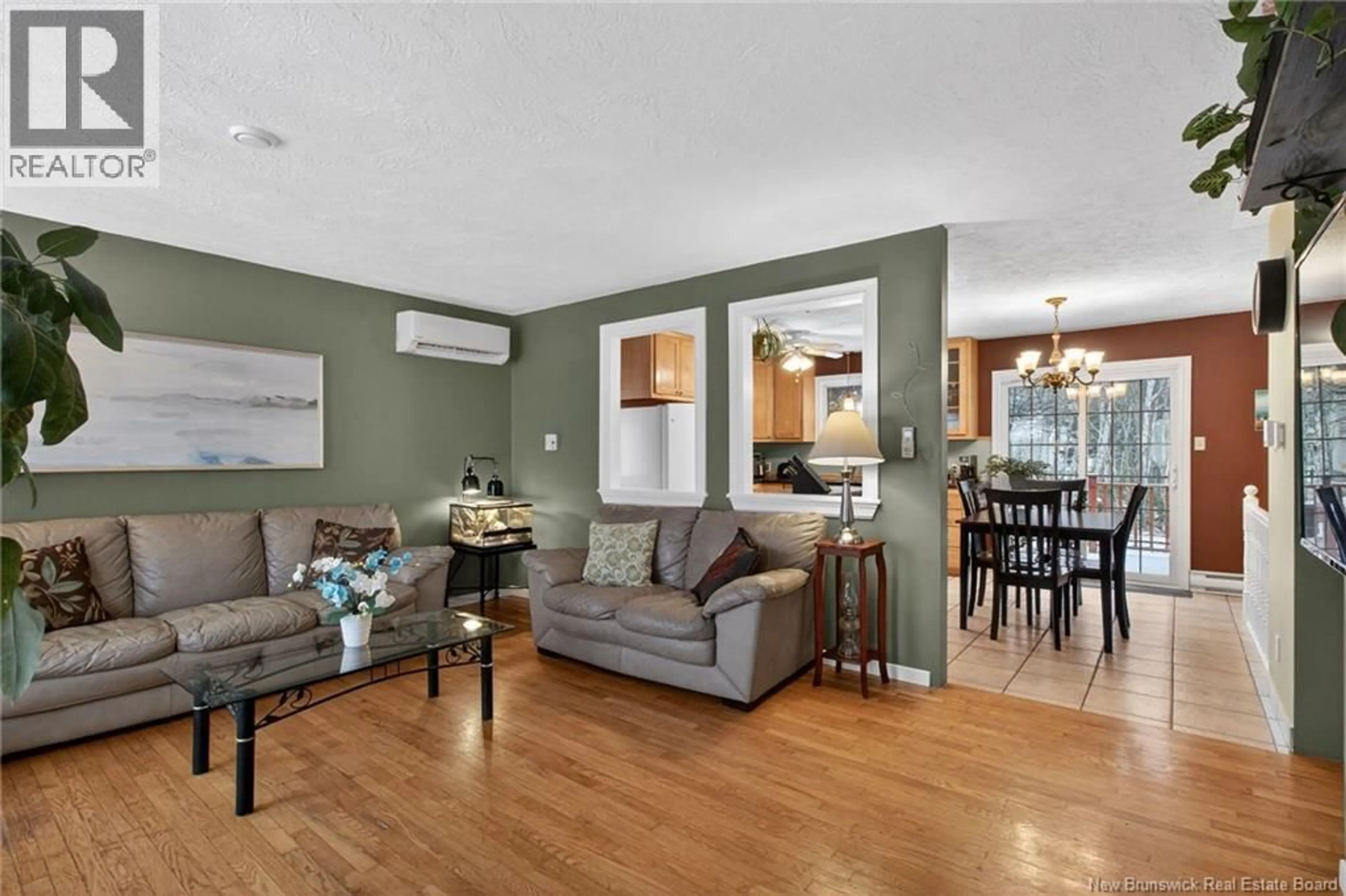 Living room with furniture, wood/laminate floor for 64 DAWN CRESCENT, Moncton New Brunswick E1G1K3