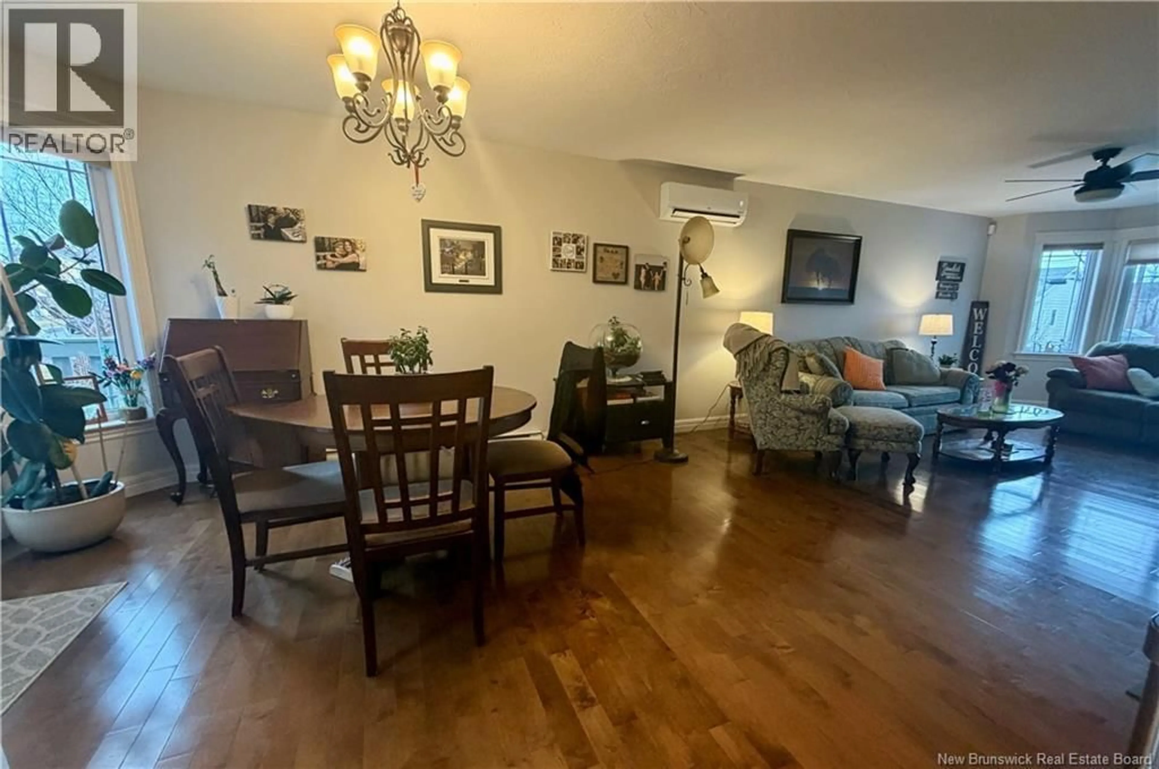 Living room with furniture, wood/laminate floor for 54 CLARENDON DRIVE, Moncton New Brunswick E1G0M9