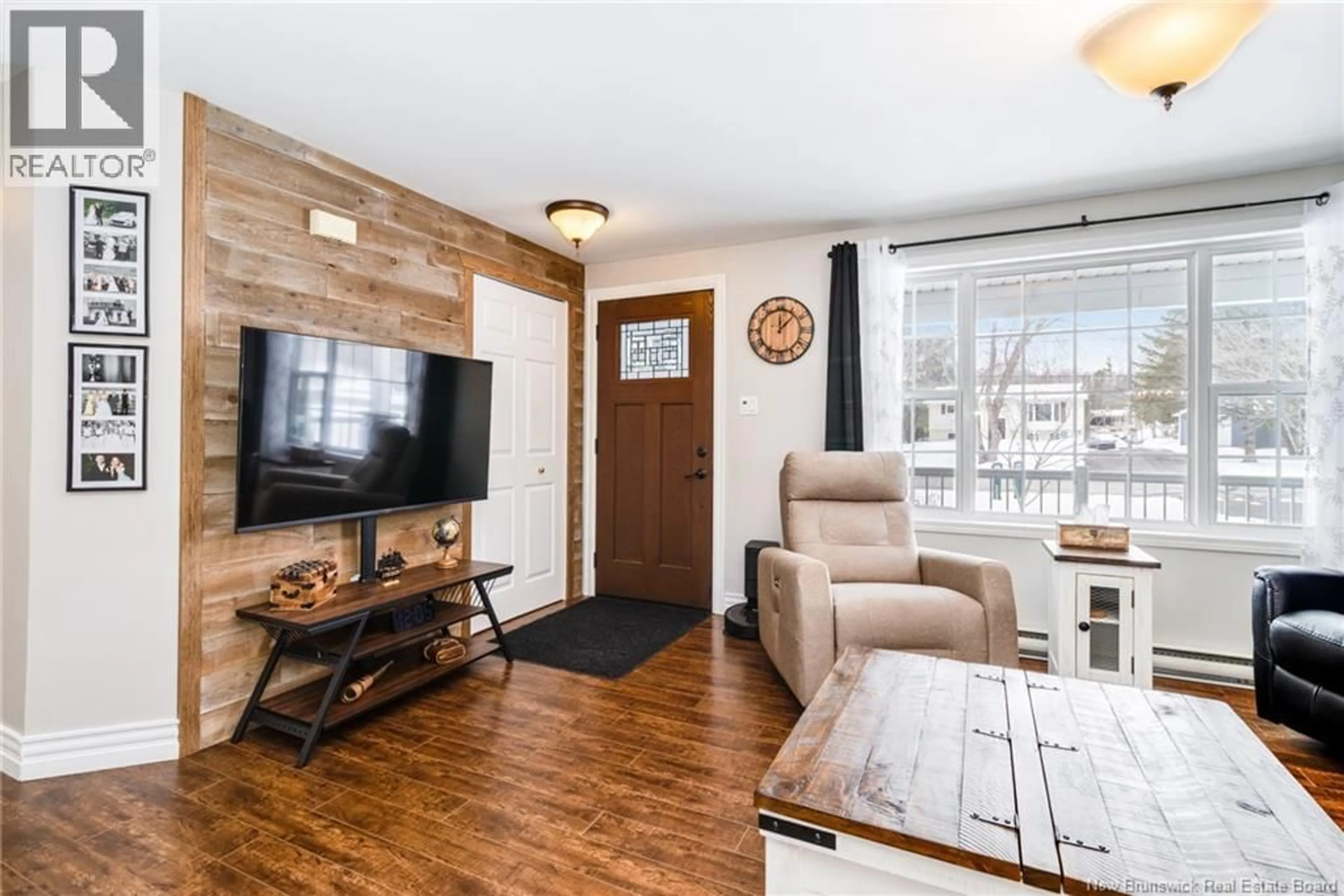 Living room with furniture, wood/laminate floor for 4A MCLEAN AVENUE, Oromocto New Brunswick E2V3N5