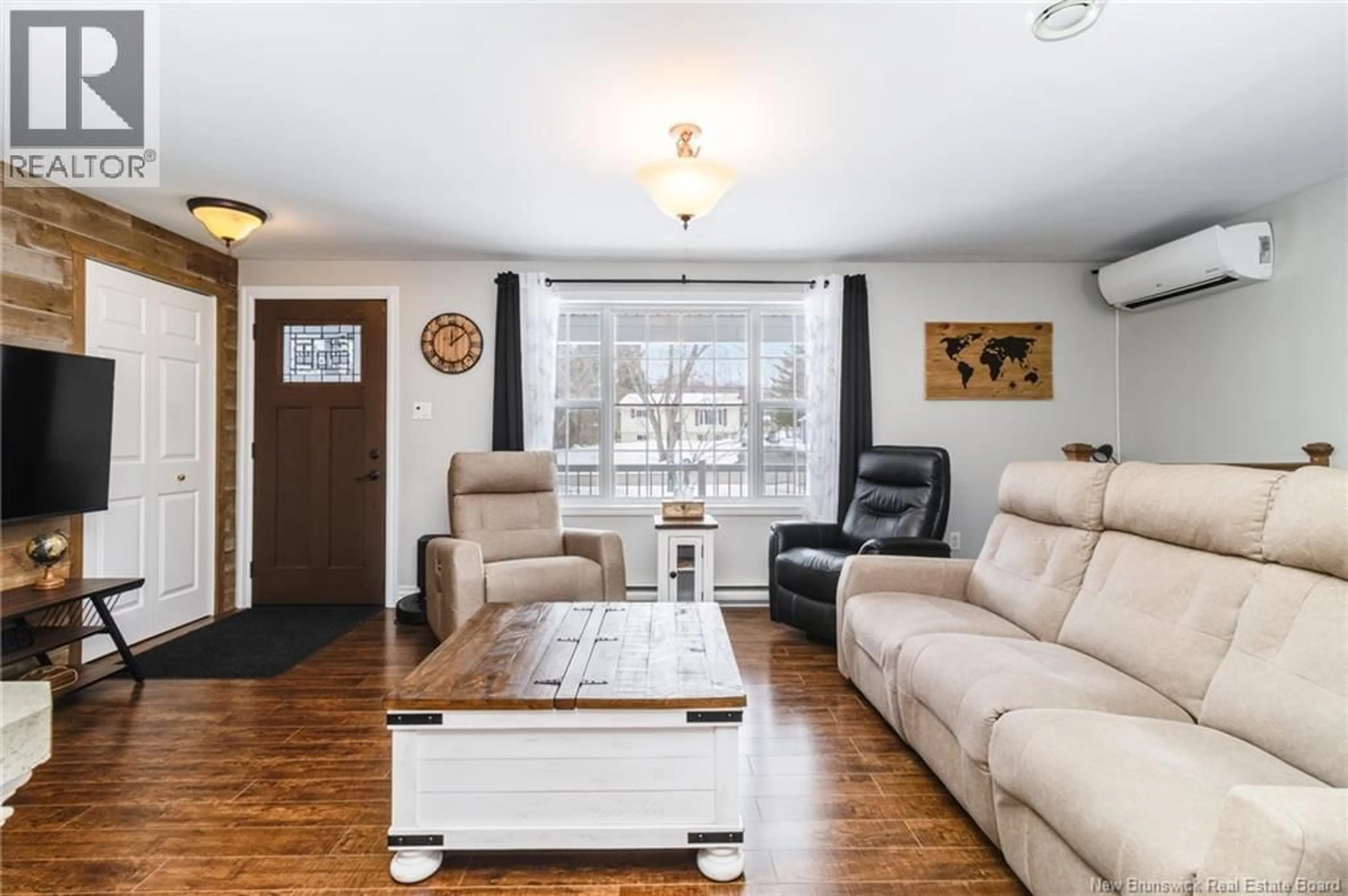 Living room with furniture, wood/laminate floor for 4A MCLEAN AVENUE, Oromocto New Brunswick E2V3N5