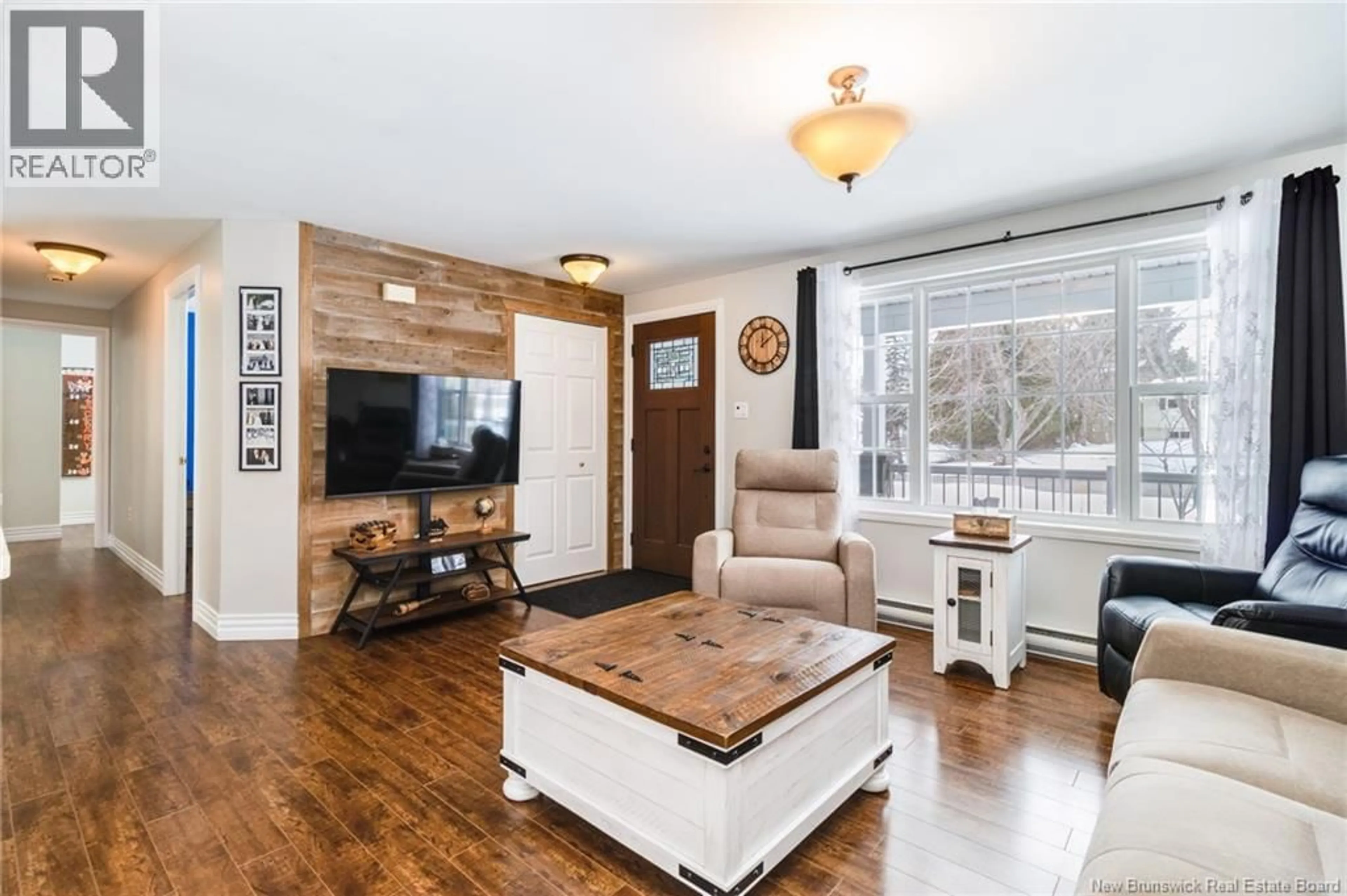 Living room with furniture, wood/laminate floor for 4A MCLEAN AVENUE, Oromocto New Brunswick E2V3N5