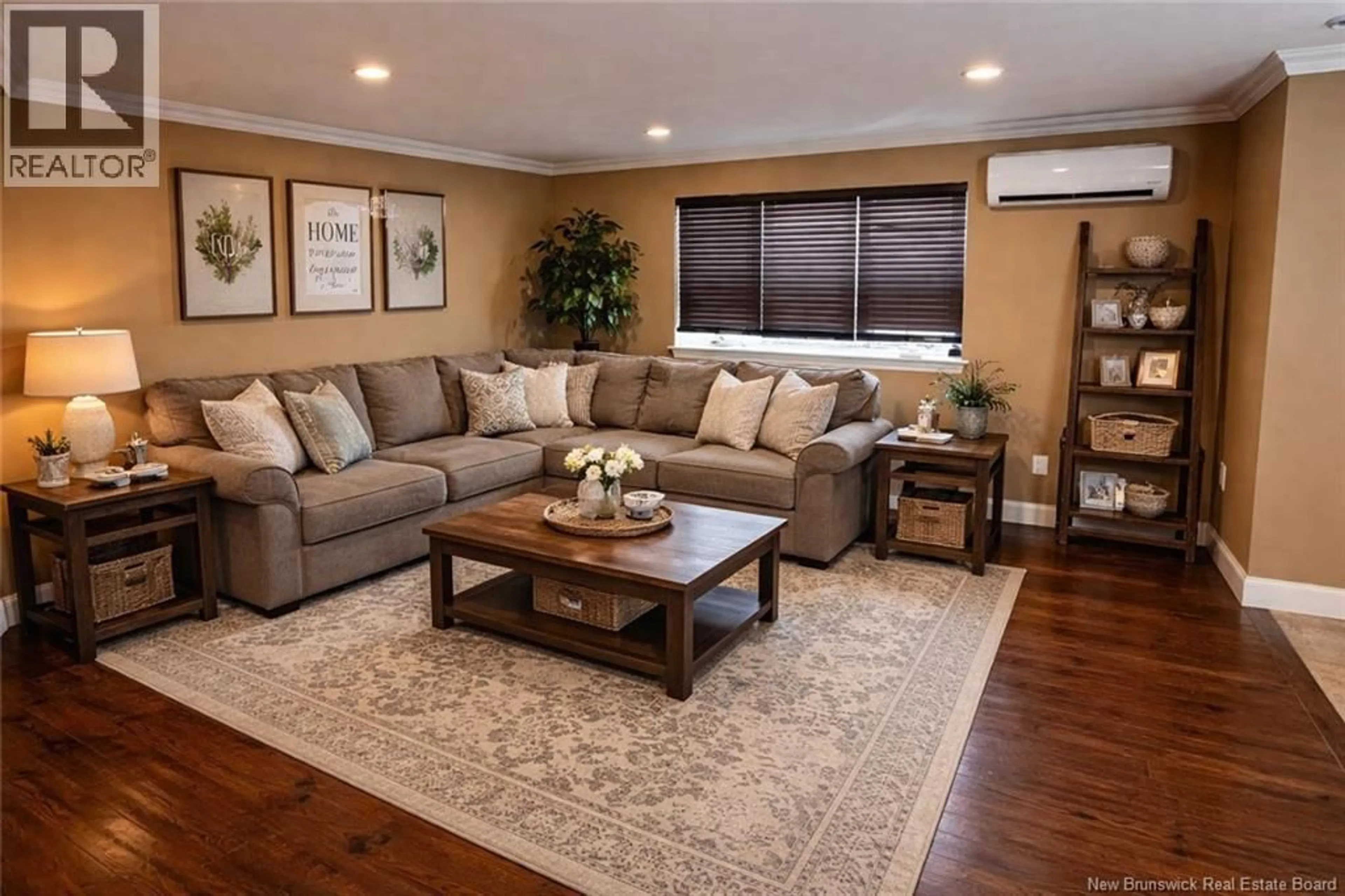 Living room with furniture, wood/laminate floor for 26 ASPENROSE COURT, Moncton New Brunswick E1G0G6