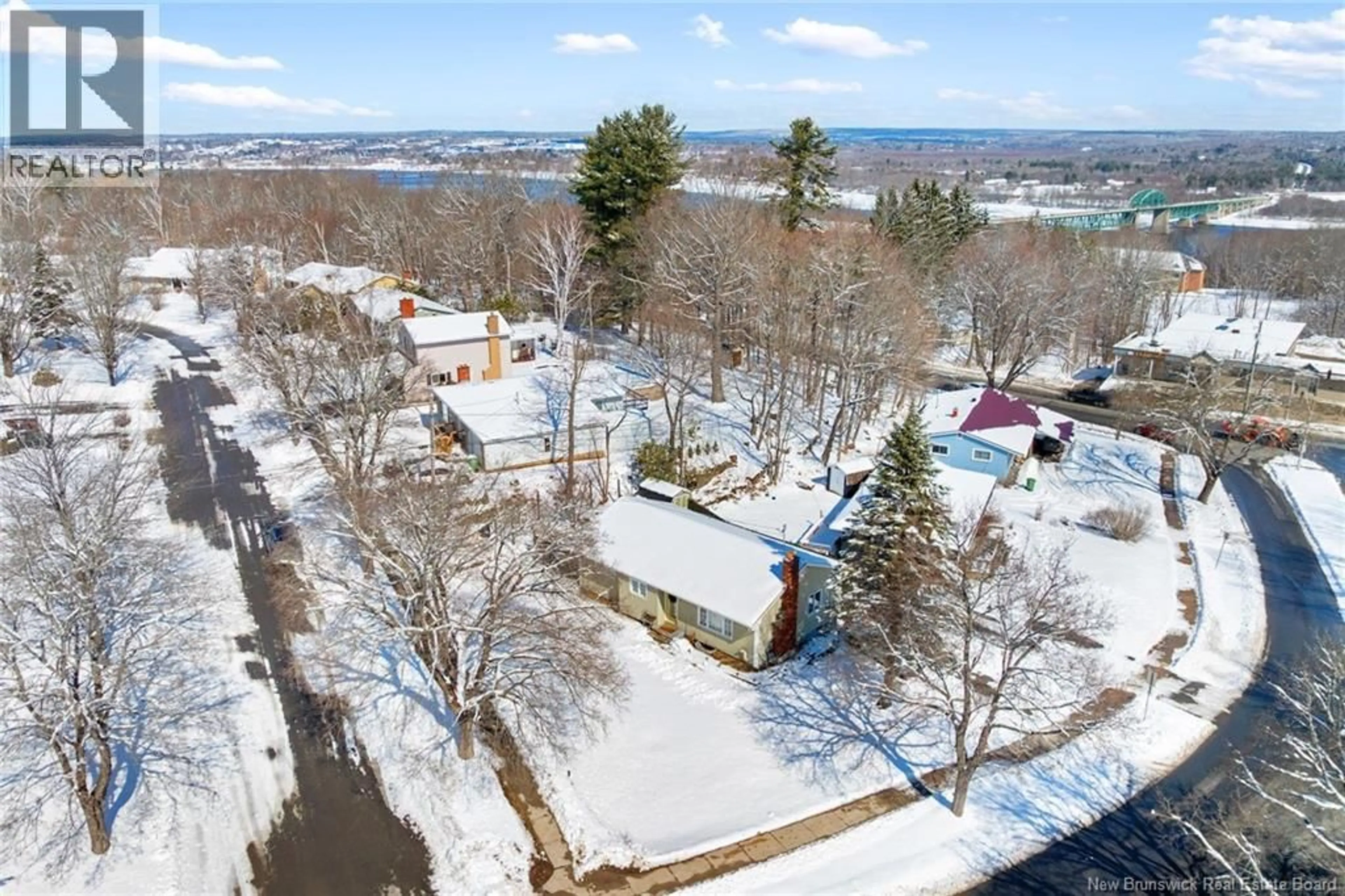 A pic from outside/outdoor area/front of a property/back of a property/a pic from drone, mountain view for 8 SURREY CRESCENT, Fredericton New Brunswick E3B4L3