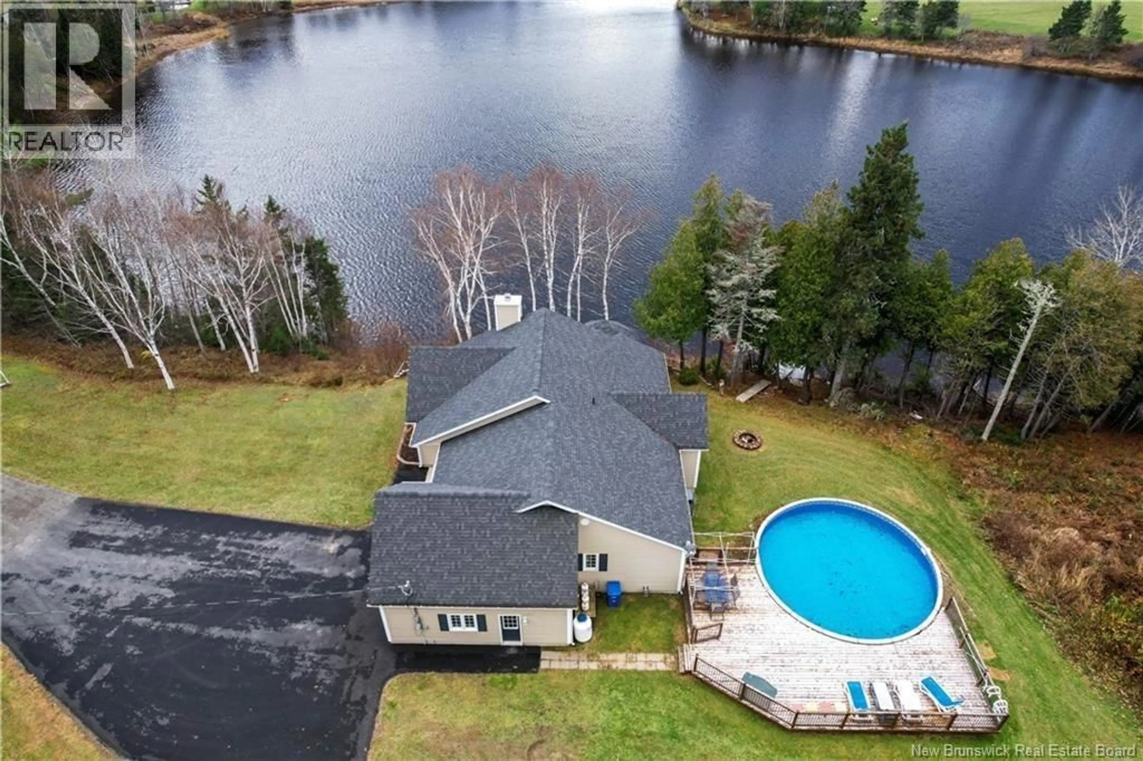 A pic from outside/outdoor area/front of a property/back of a property/a pic from drone, water/lake/river/ocean view for 750 SAINT-CHARLES S, Saint-Charles New Brunswick E4W4X7