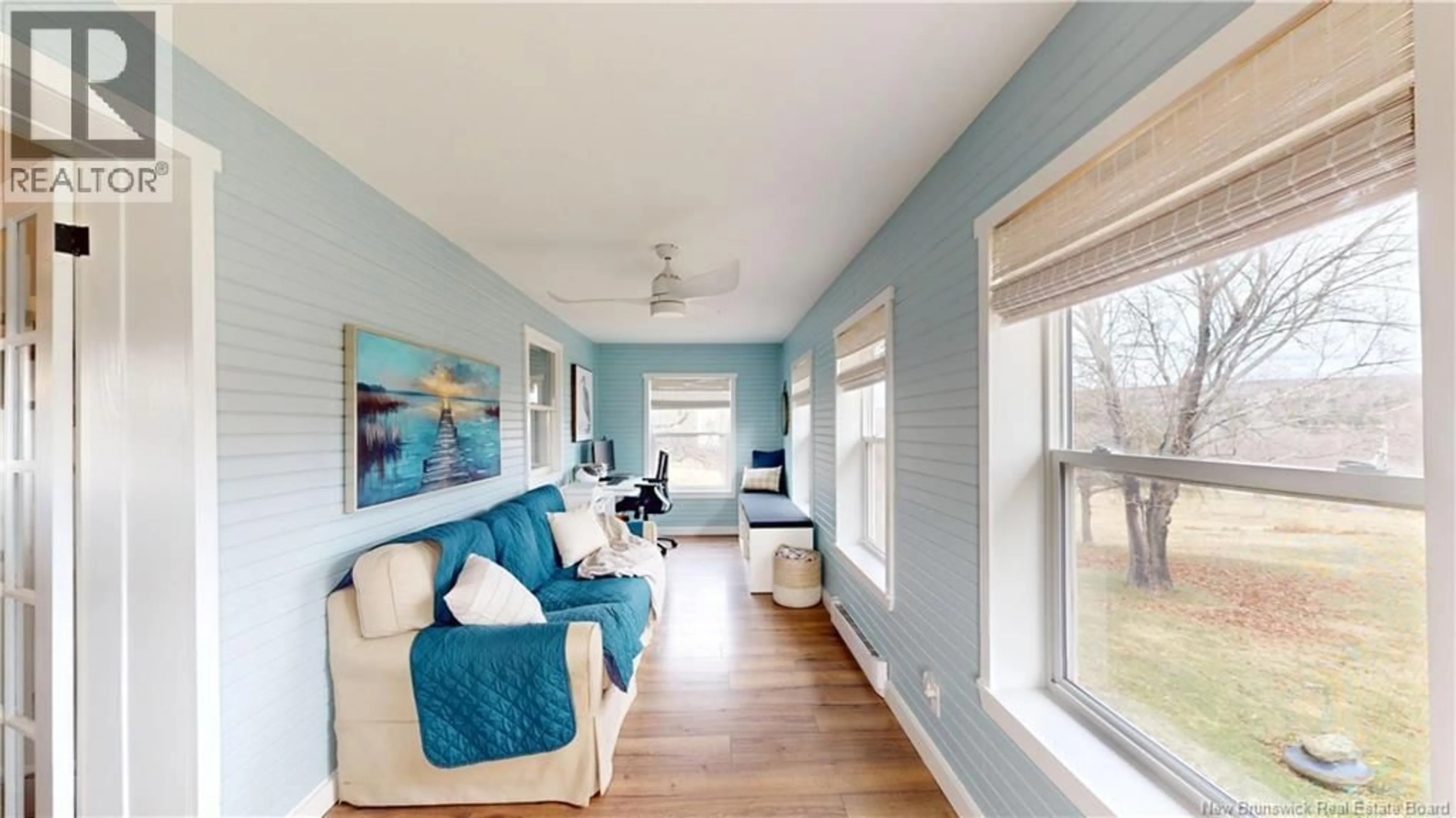 Living room with furniture, wood/laminate floor for 1617 ROUTE 121 ROUTE, Norton New Brunswick E5T1P6