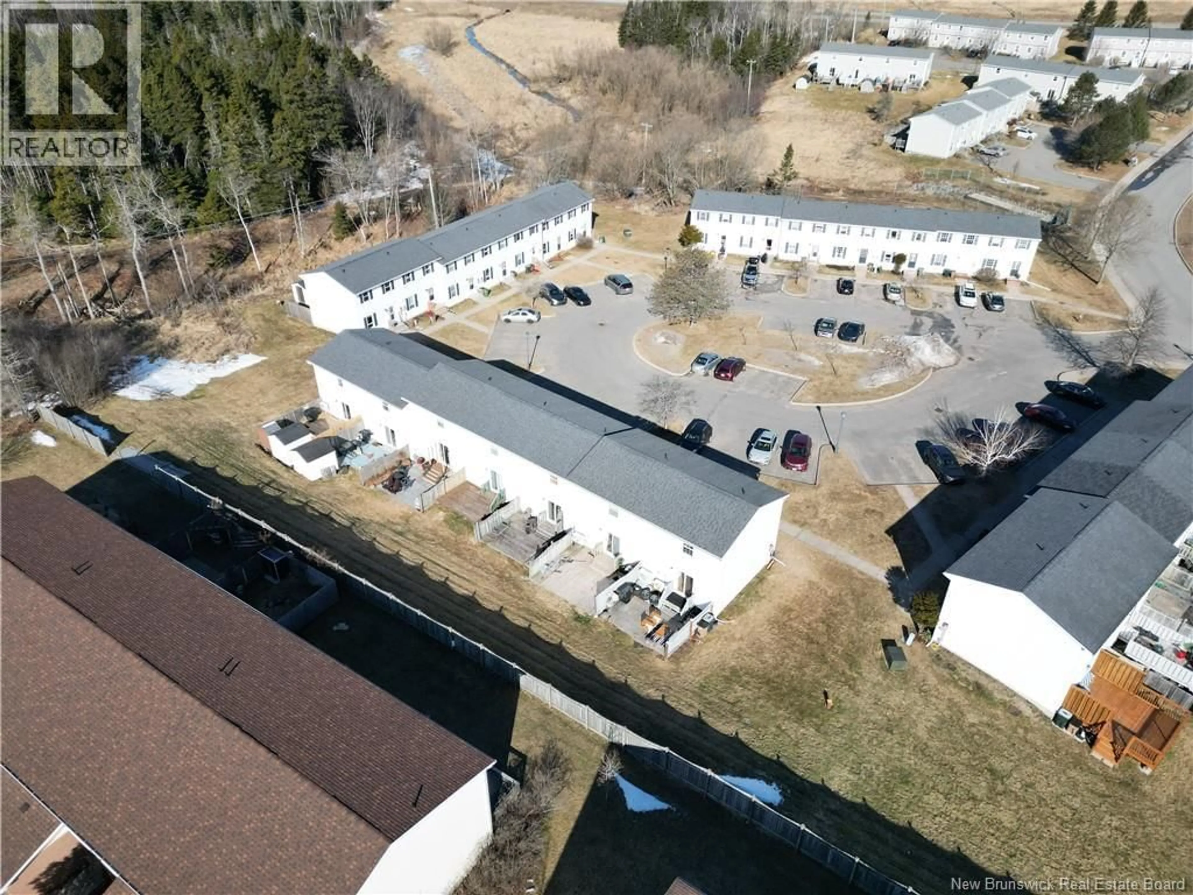 A pic from outside/outdoor area/front of a property/back of a property/a pic from drone, building for 19 MEADOWLAND TERRACE, Saint John New Brunswick E2M5S4