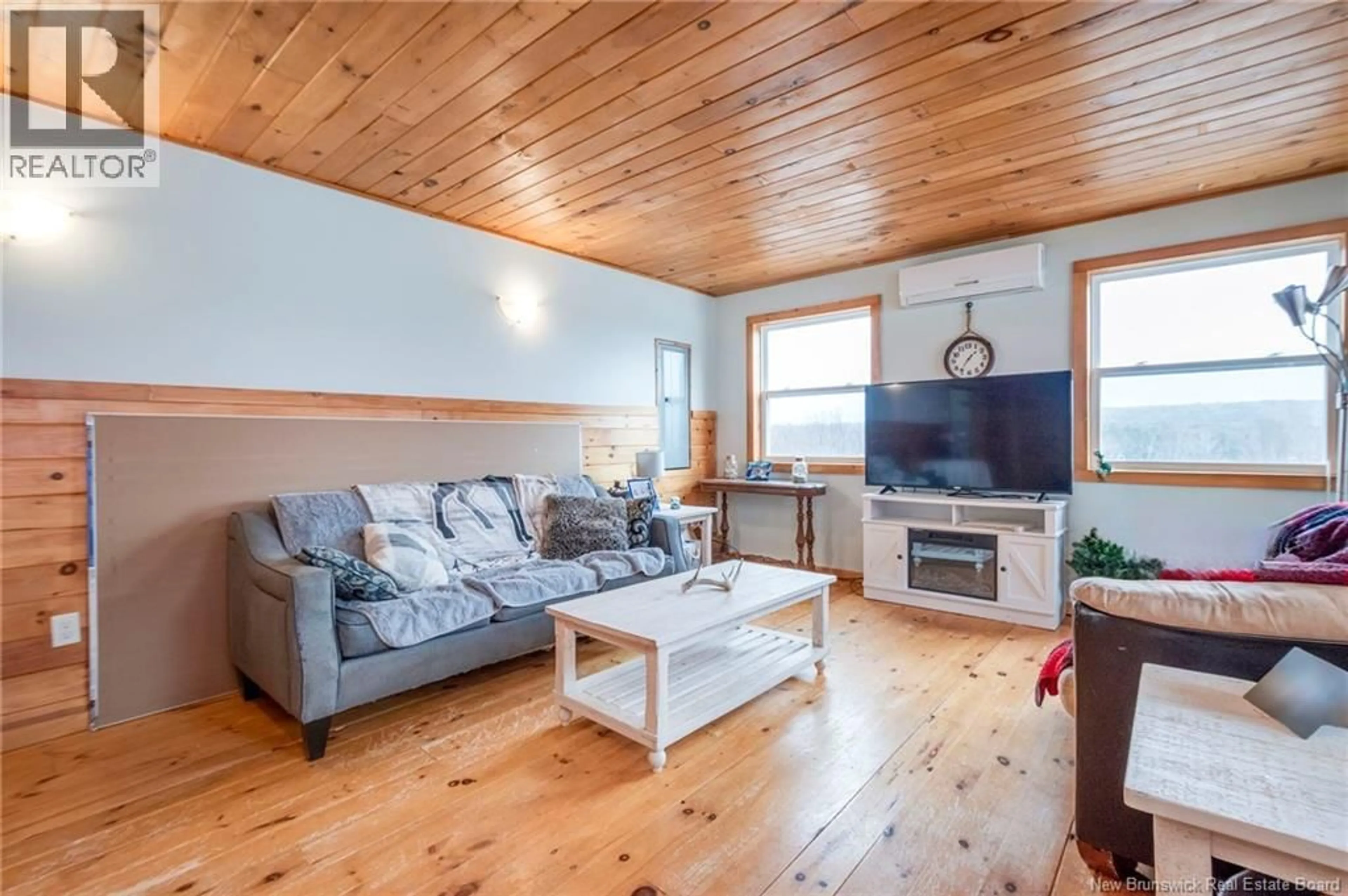 Living room with furniture, wood/laminate floor for 2253 ROUTE 860, Salt Springs New Brunswick E5N4E5