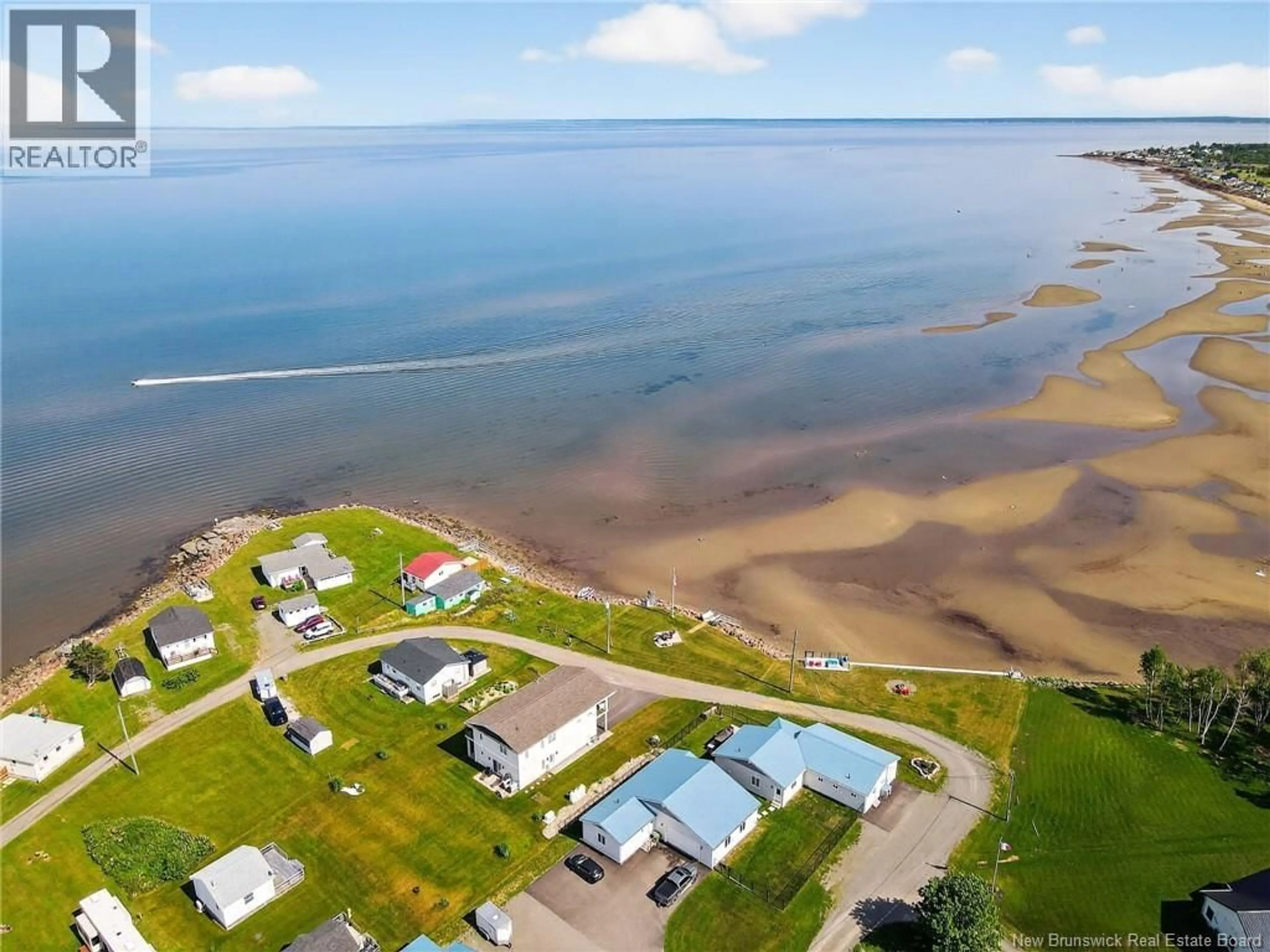 A pic from outside/outdoor area/front of a property/back of a property/a pic from drone, water/lake/river/ocean view for 58 VENICE AVENUE, Grande-Digue New Brunswick E4R5X4