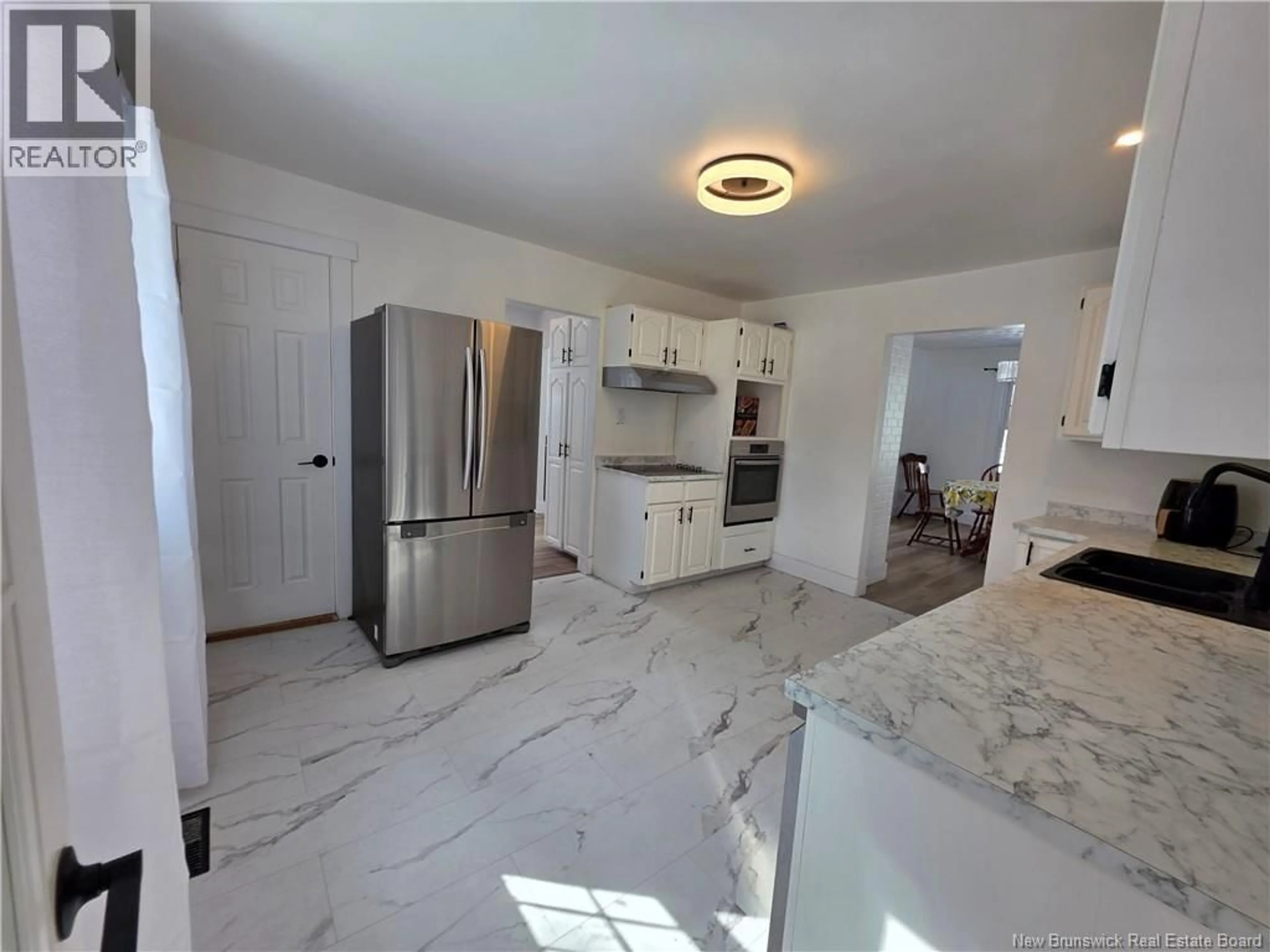 Open concept kitchen, ceramic/tile floor for 38 CENTENNIAL DRIVE, Minto New Brunswick E4B3R9