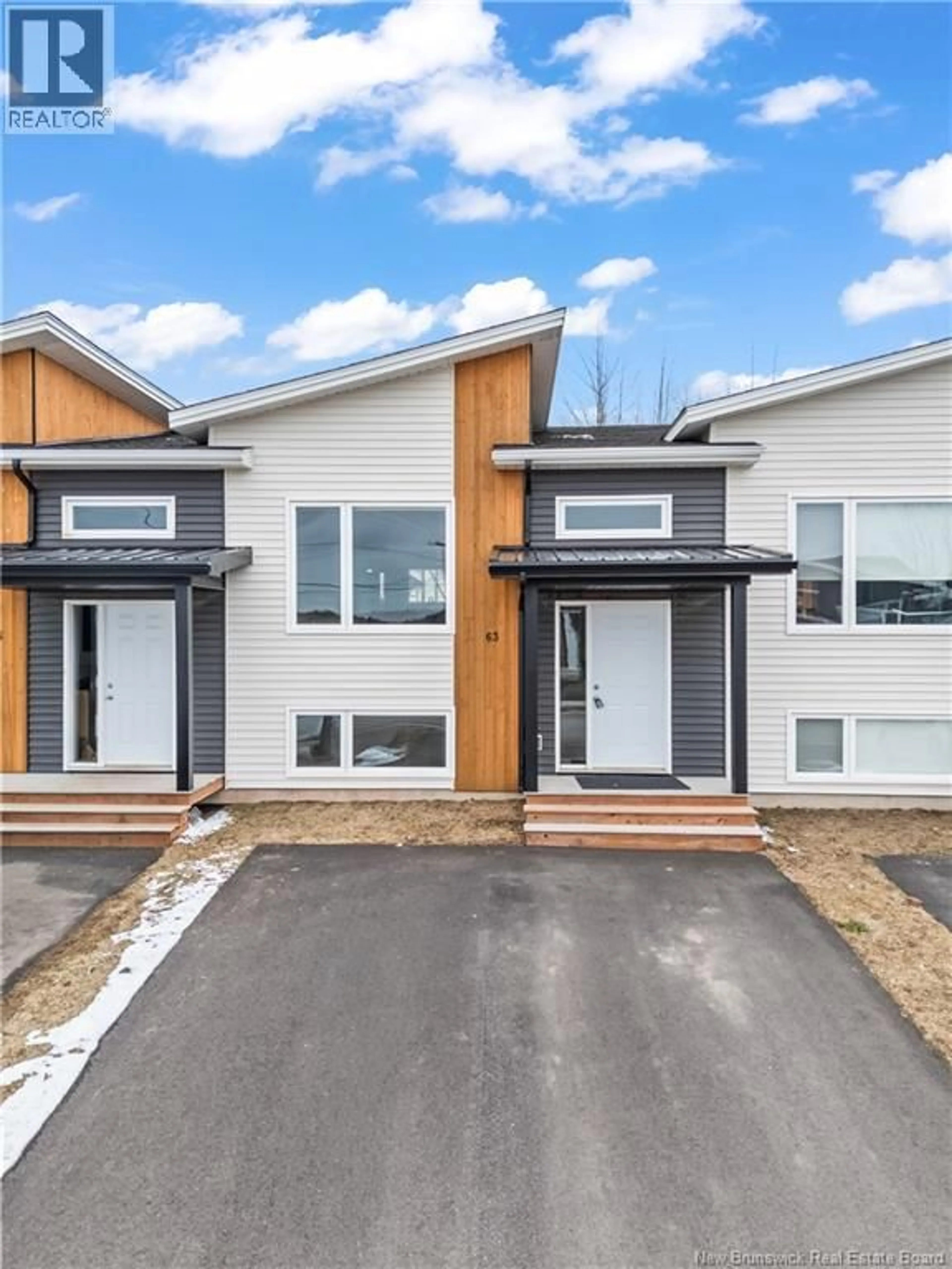Home with vinyl exterior material, street for 63 AIME STREET, Dieppe New Brunswick E1A9K8