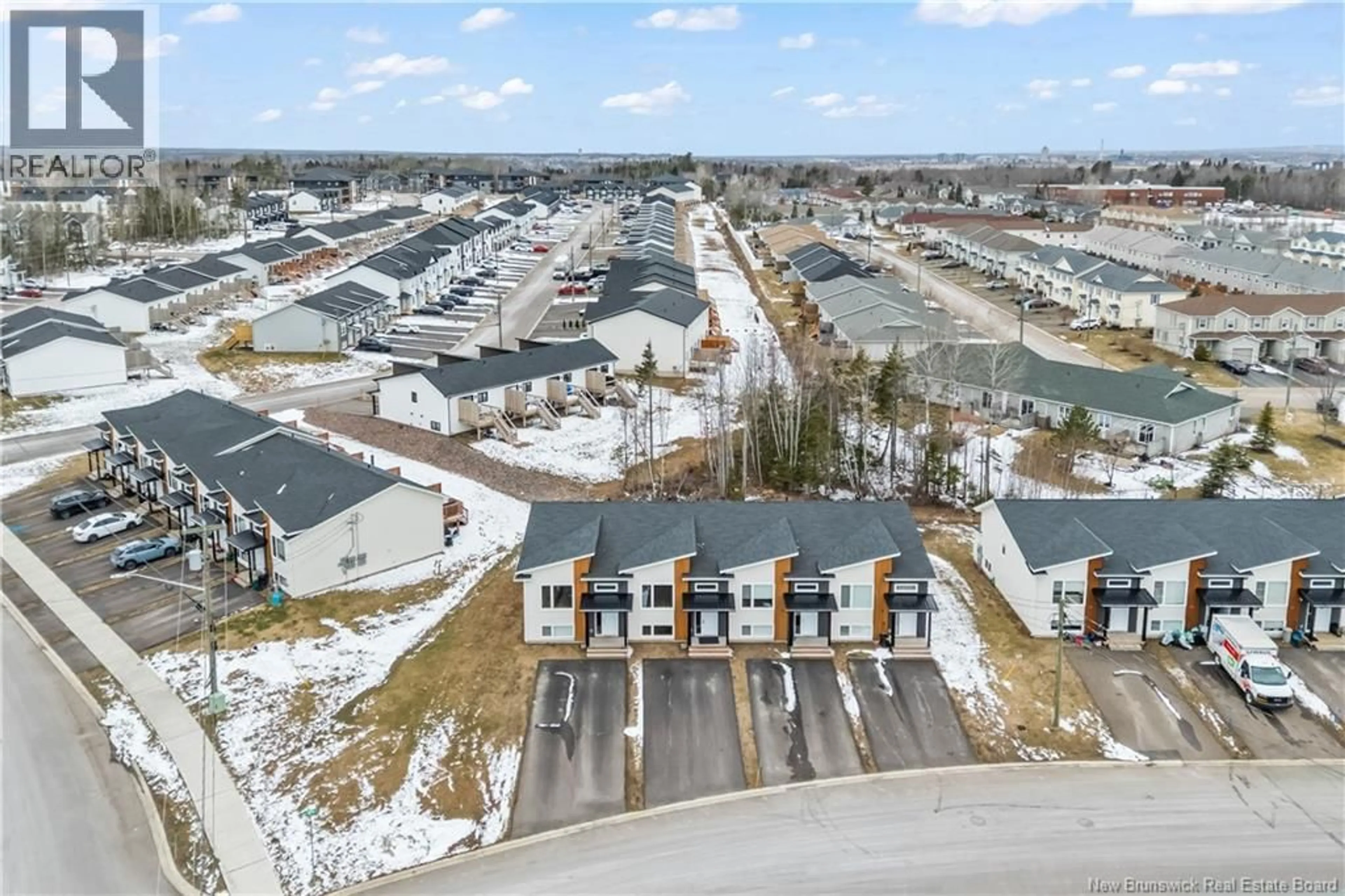 A pic from outside/outdoor area/front of a property/back of a property/a pic from drone, unknown for 63 AIME STREET, Dieppe New Brunswick E1A9K8