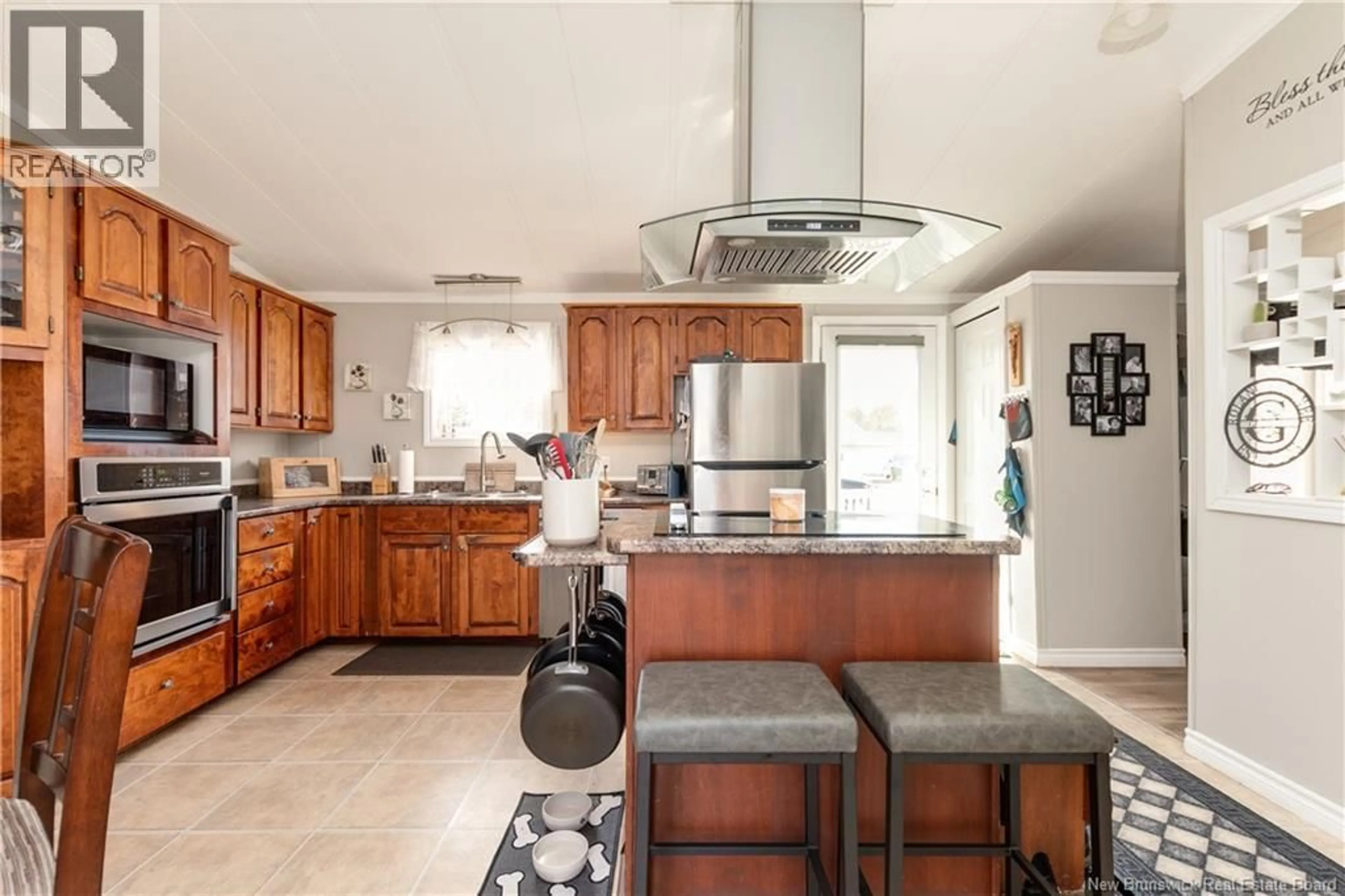 Open concept kitchen, ceramic/tile floor for 13 BLUE JAY CRESCENT, Moncton New Brunswick E1H2S1