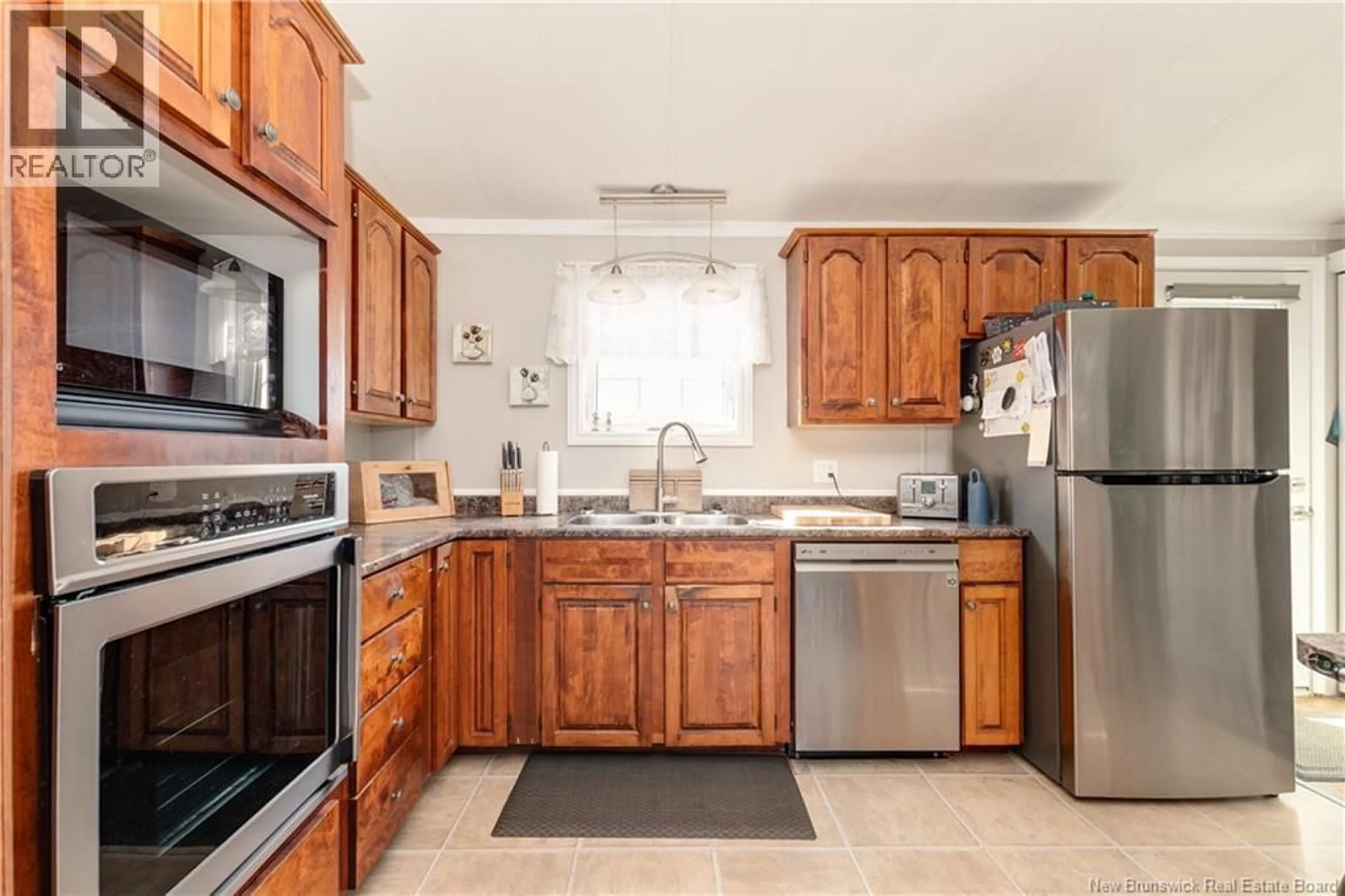 Standard kitchen, ceramic/tile floor for 13 BLUE JAY CRESCENT, Moncton New Brunswick E1H2S1